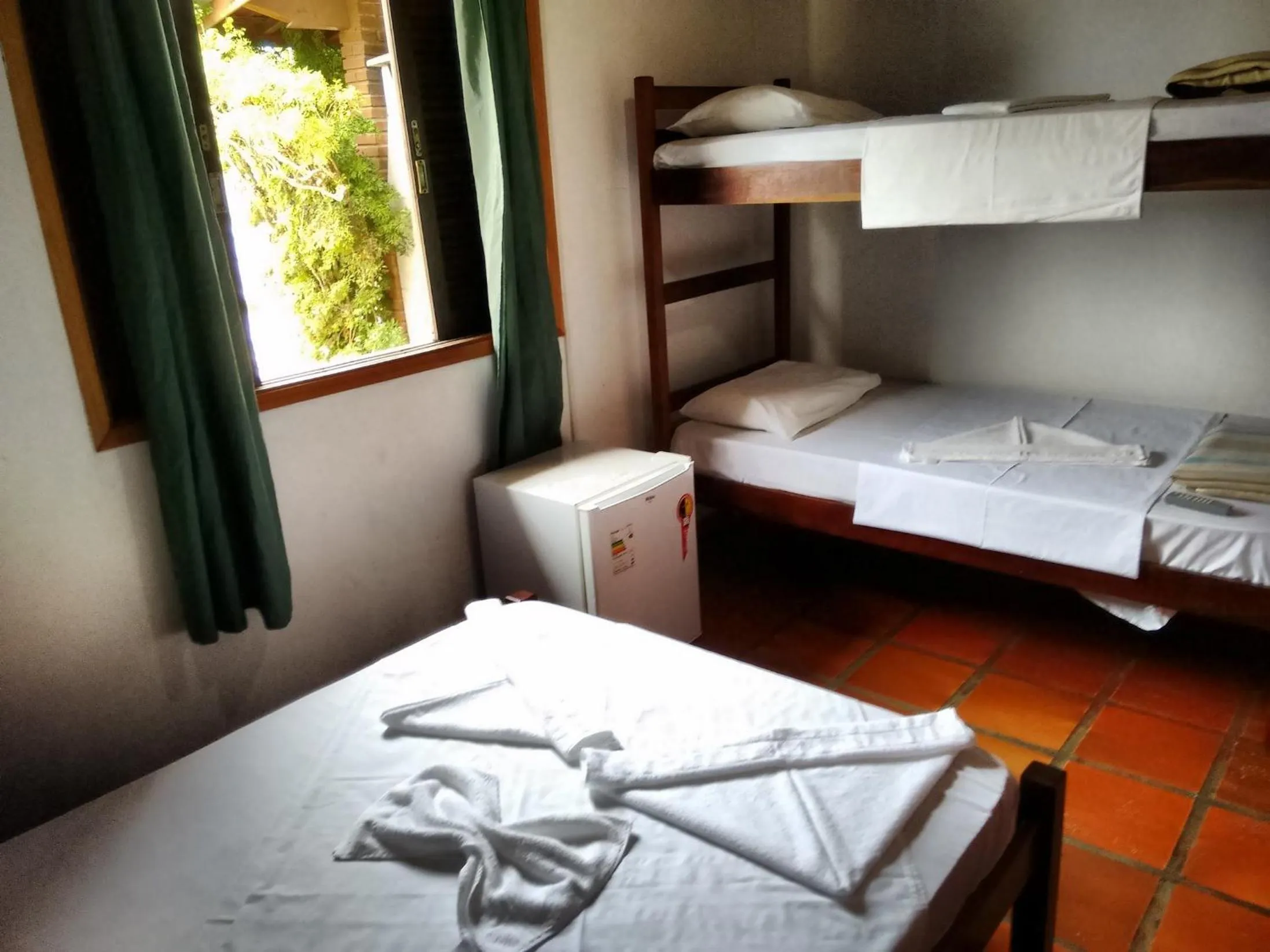 Bed in Pousada Edson