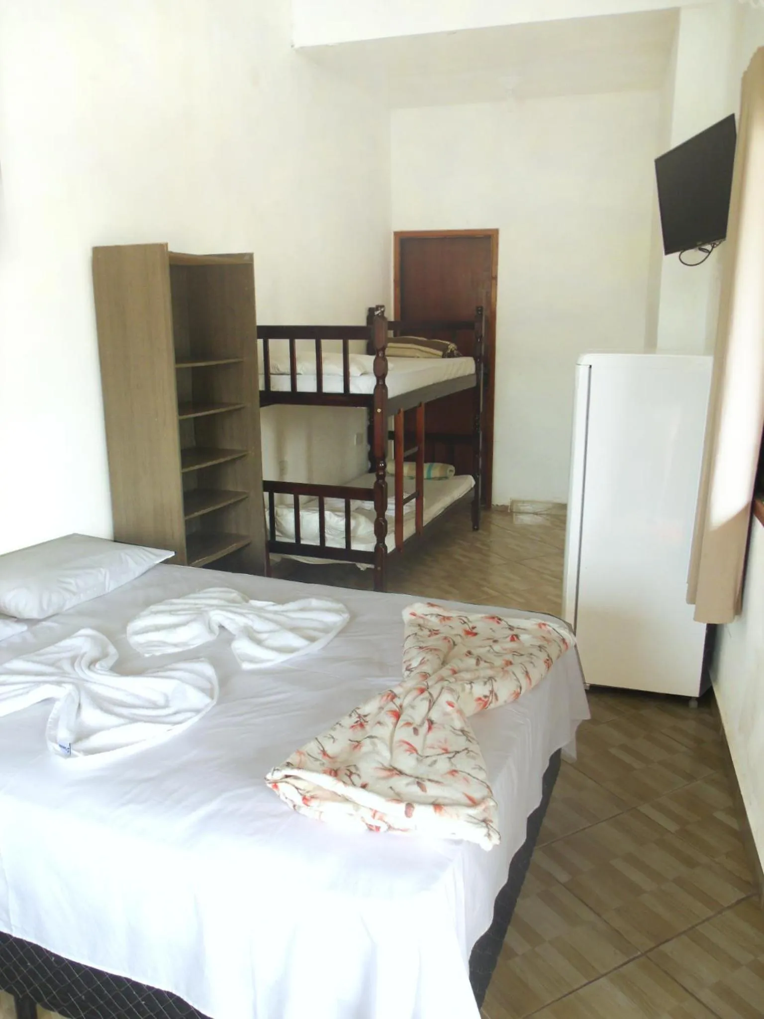 Bed in Pousada Edson