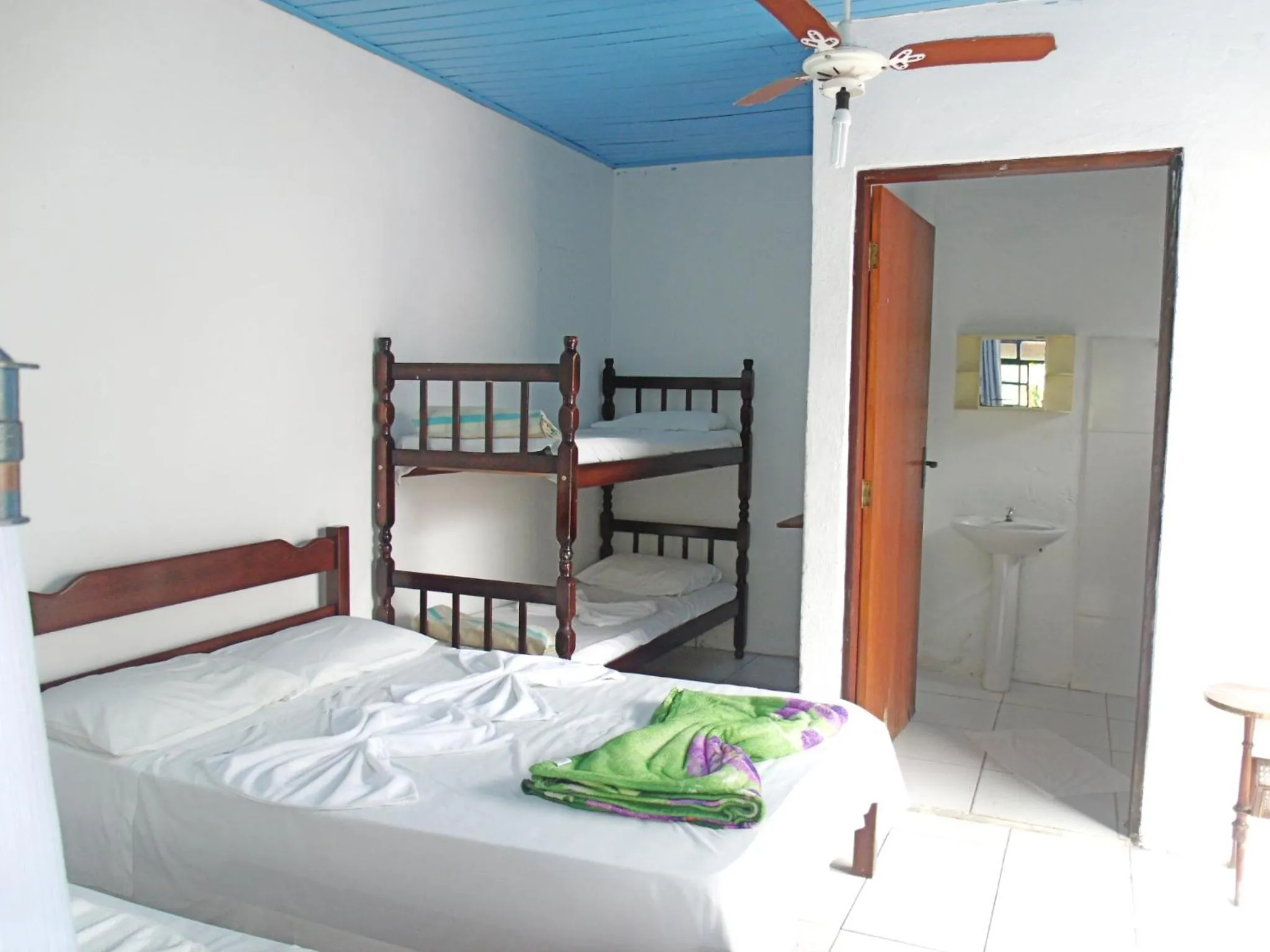 Bed in Pousada Edson