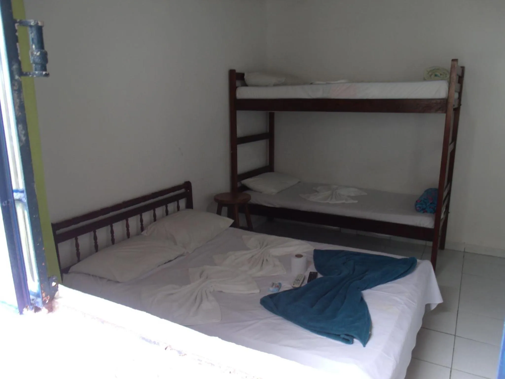 Bed in Pousada Edson