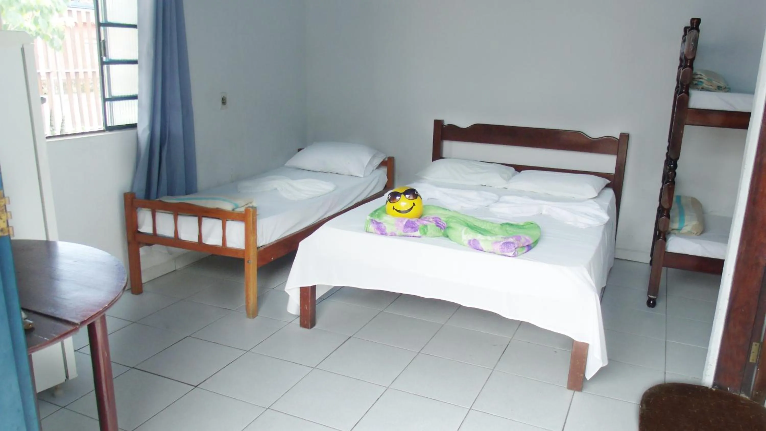 Bed in Pousada Edson