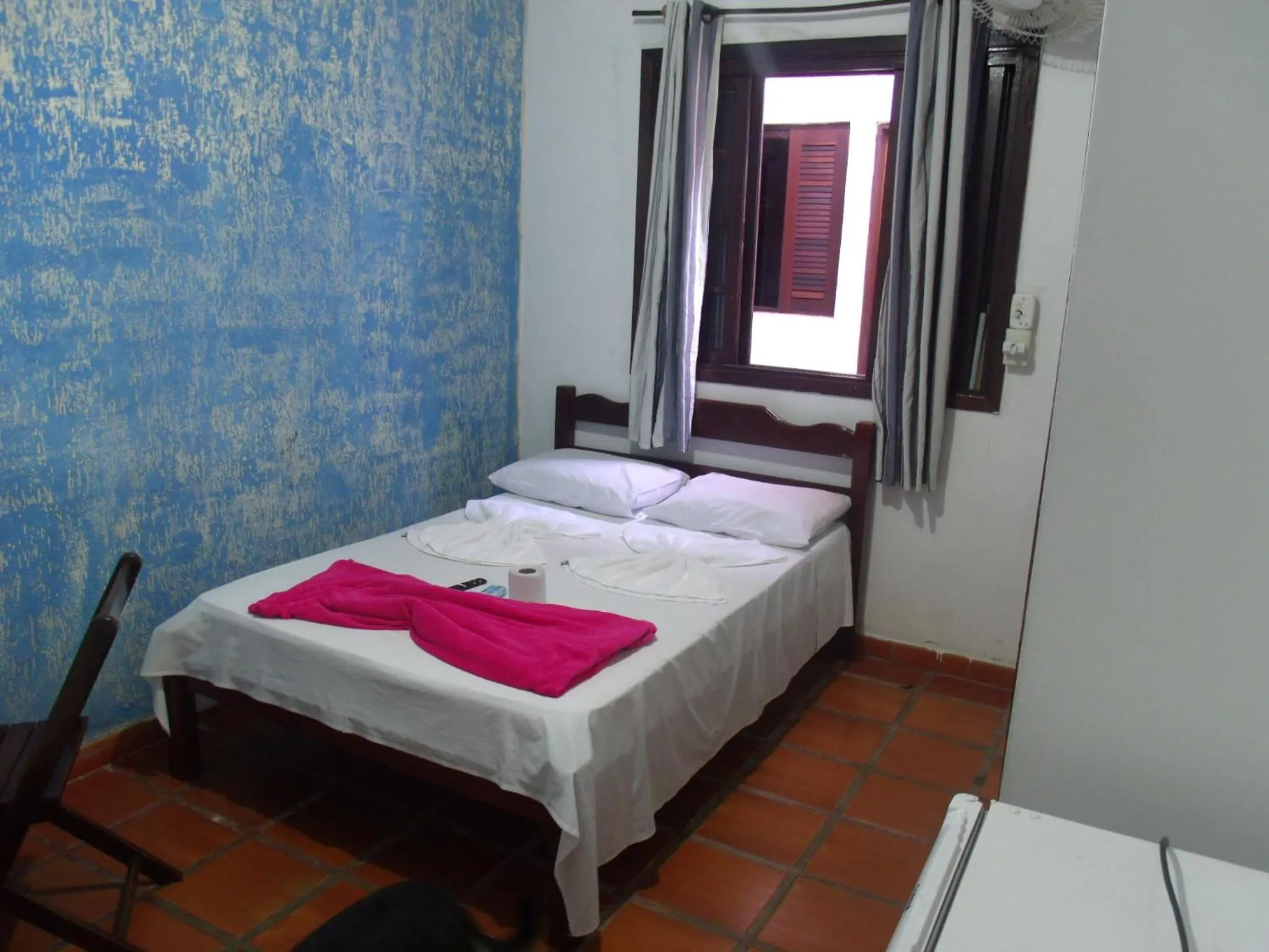 Bed in Pousada Edson