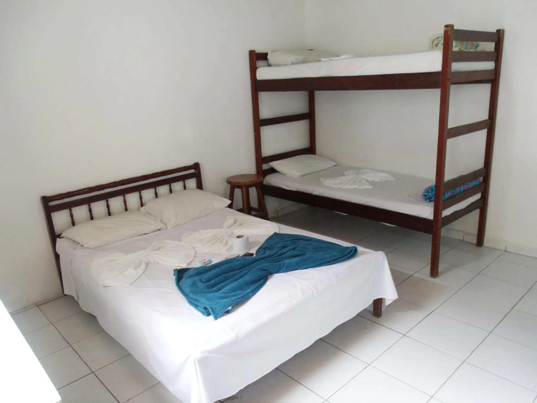 Bed in Pousada Edson