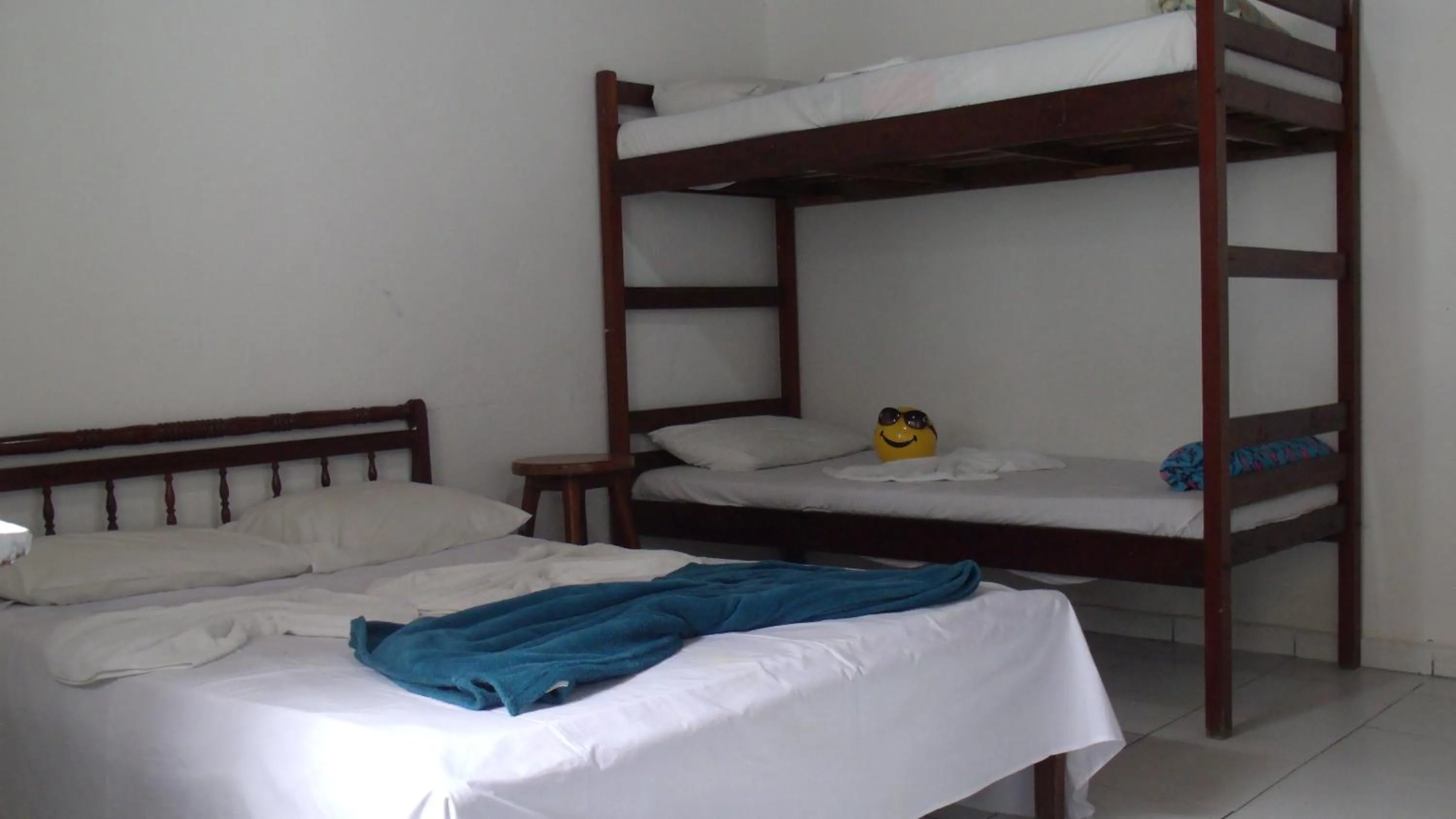 Bed in Pousada Edson