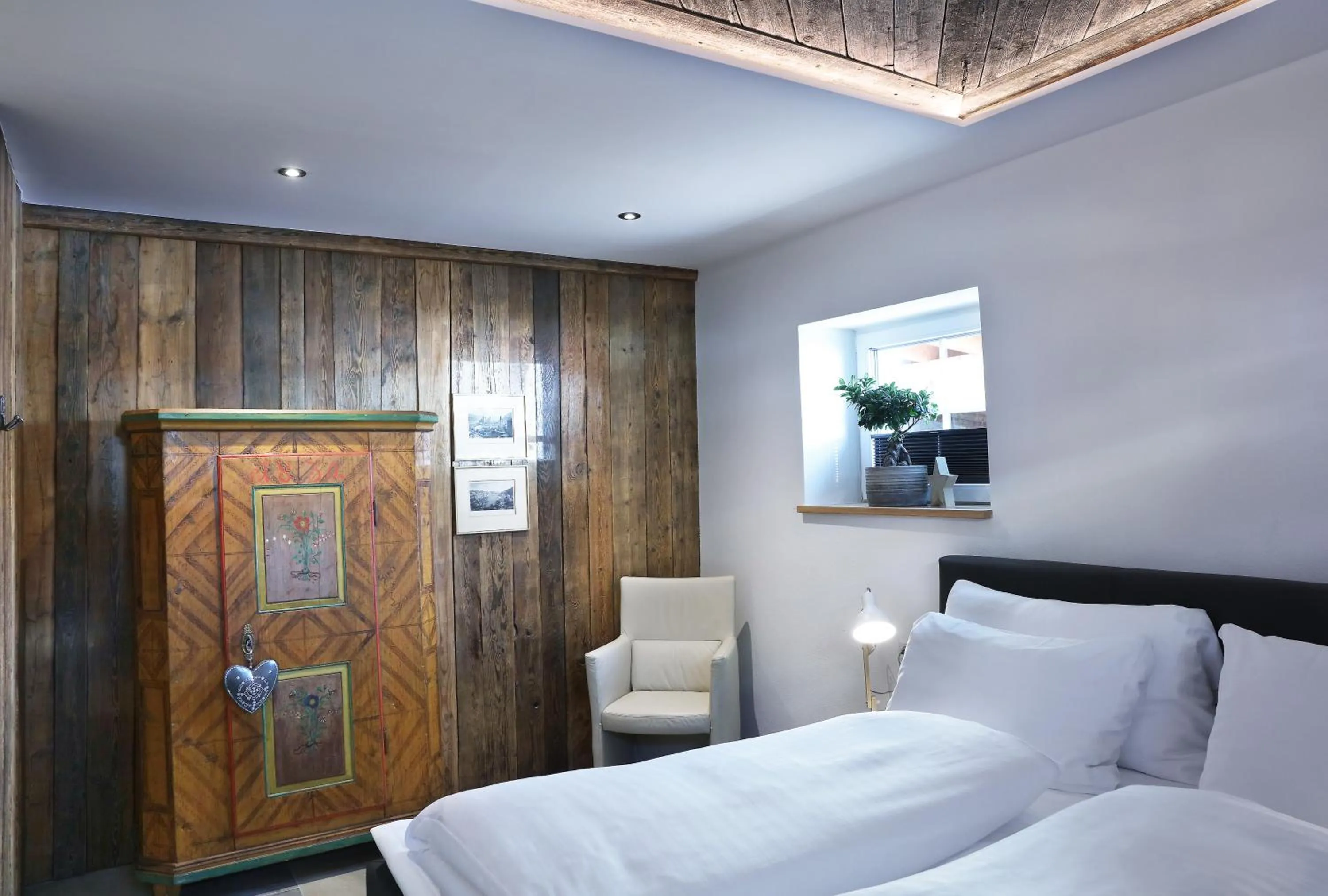 Bed in Landschützer's Country Suites