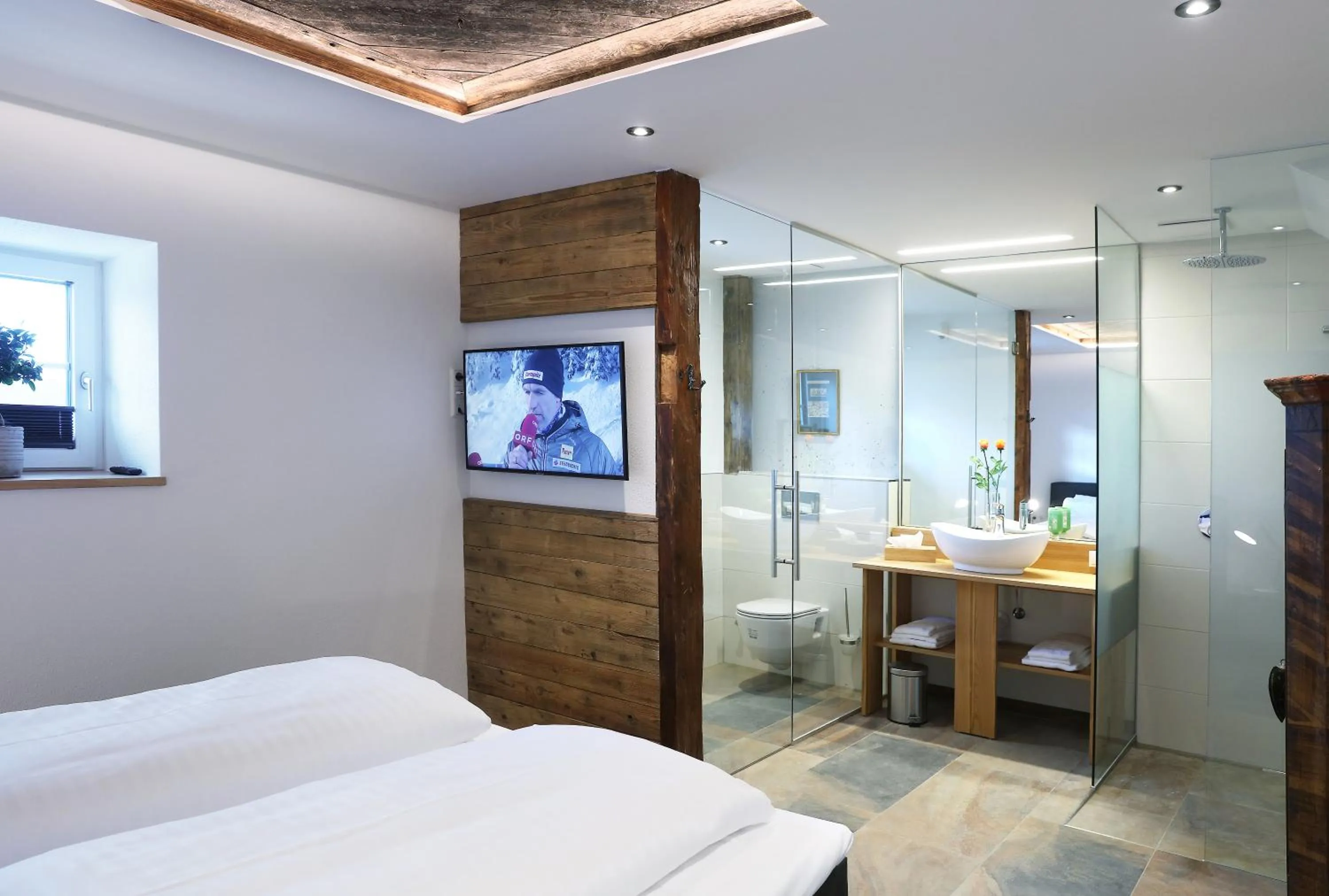 Bed in Landschützer's Country Suites