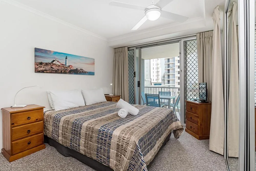 Bed in Rainbow Bay Resort Holiday Apartments