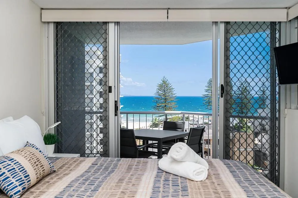 Balcony/Terrace, Bed in Rainbow Bay Resort Holiday Apartments