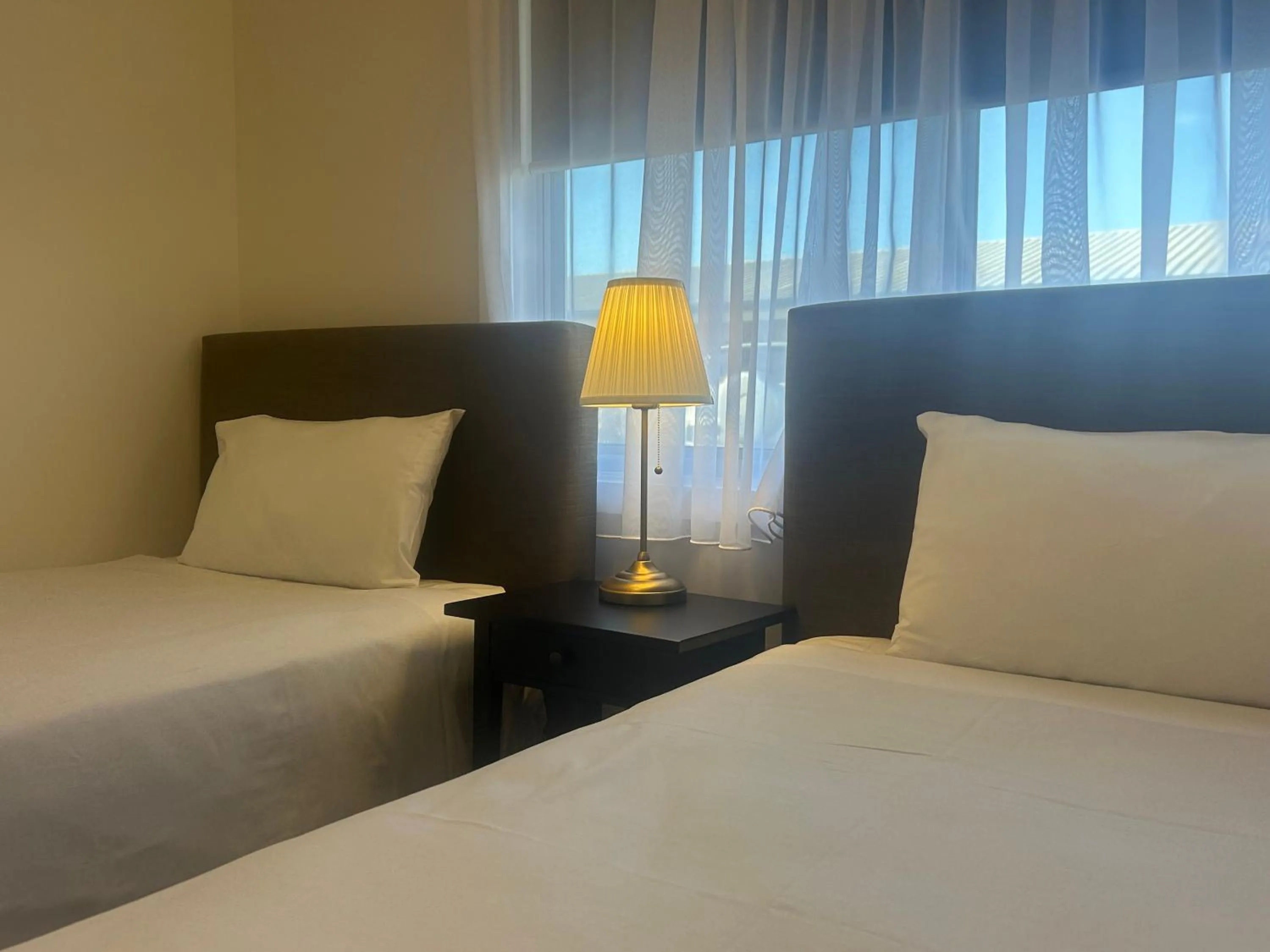 Bed in Lakeview Motel and Apartments