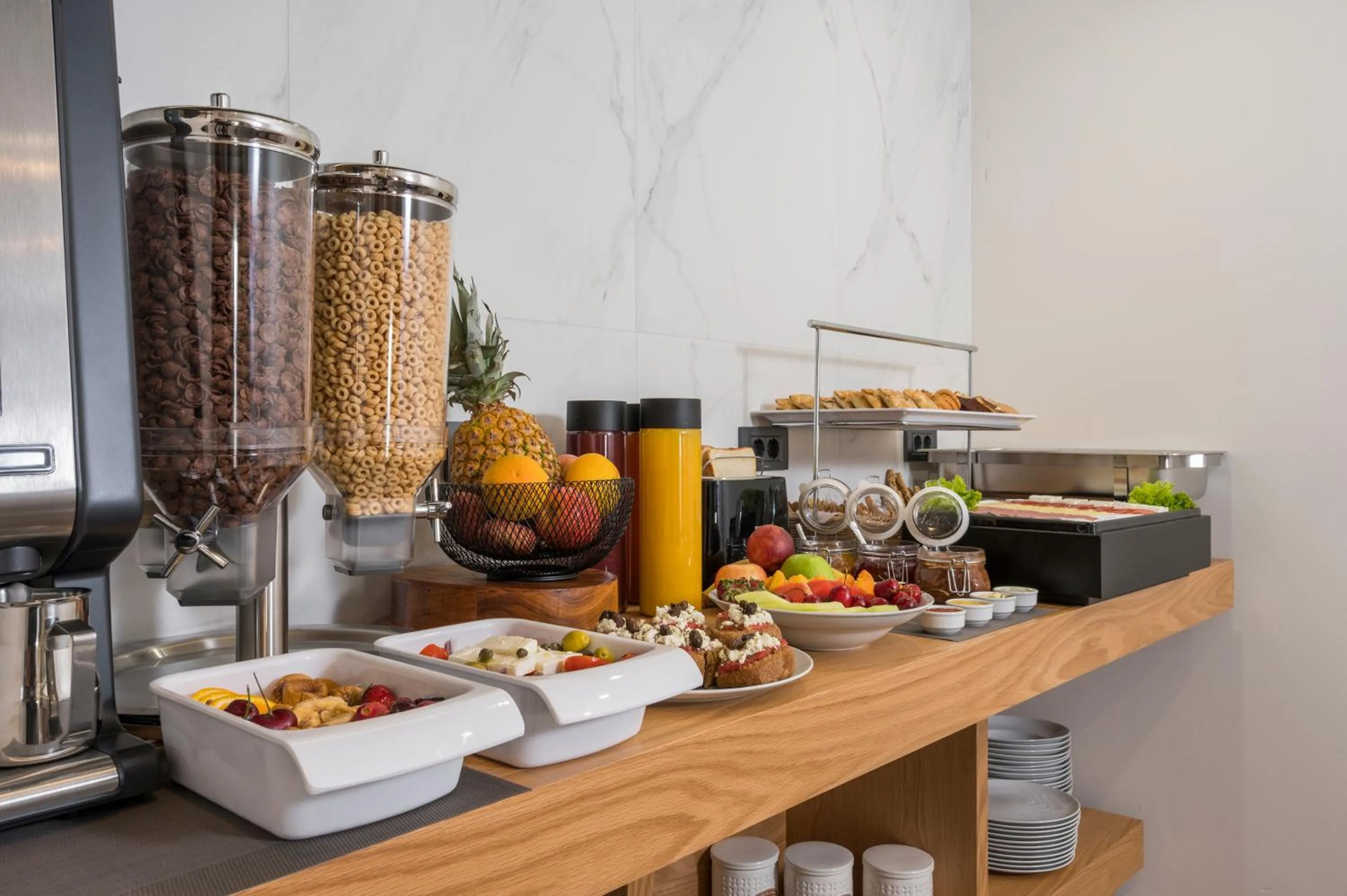 Buffet breakfast in Casa D'Irene Deluxe Hotel