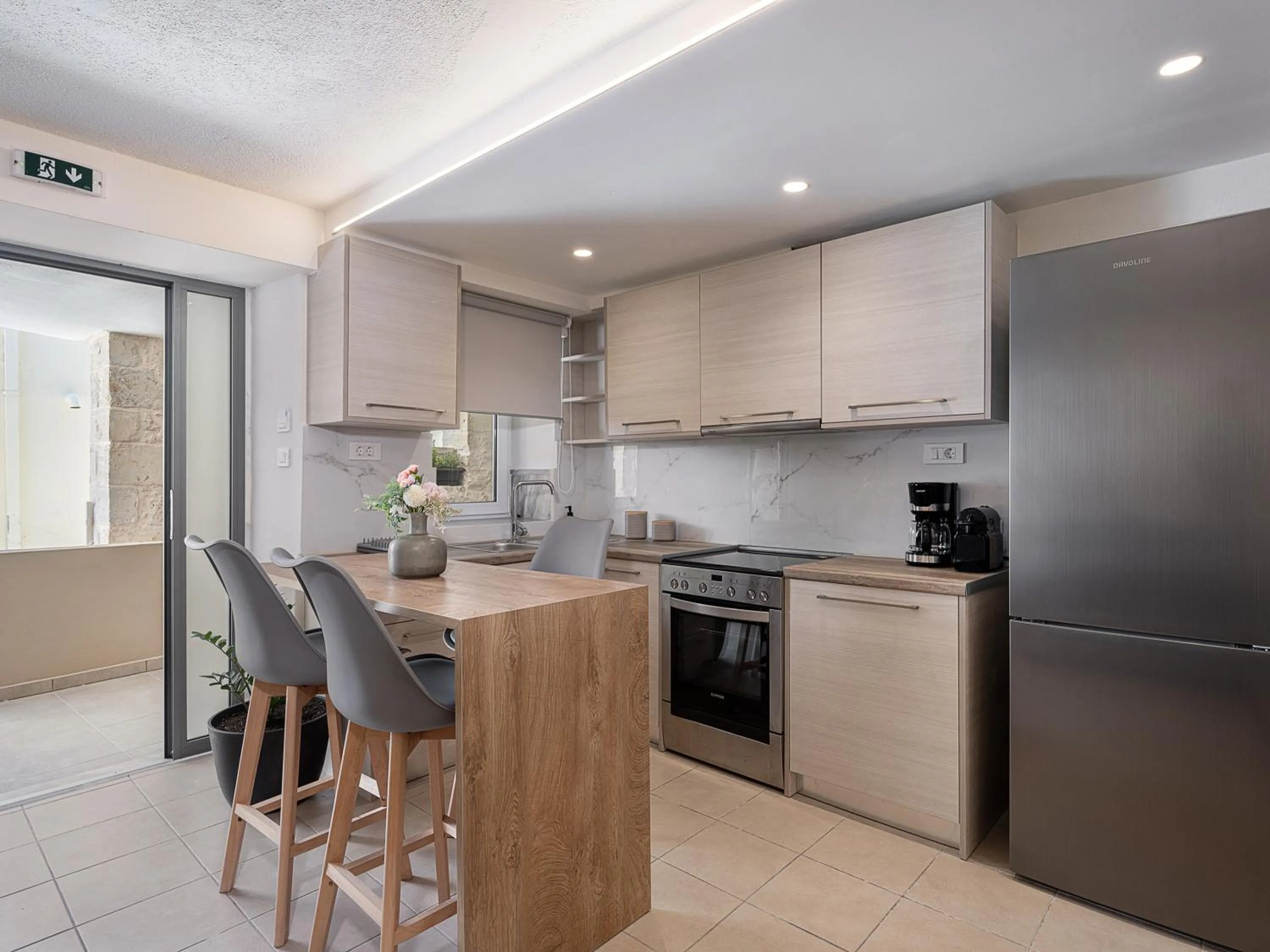 Kitchen or kitchenette in Casa D'Irene Deluxe Hotel