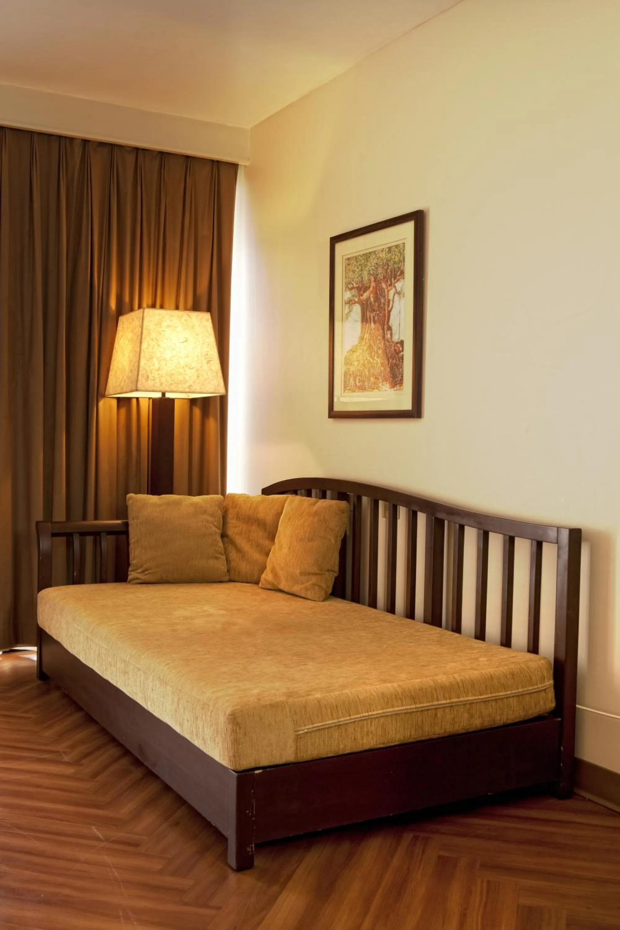 Living room, Bed in Guam Reef Hotel