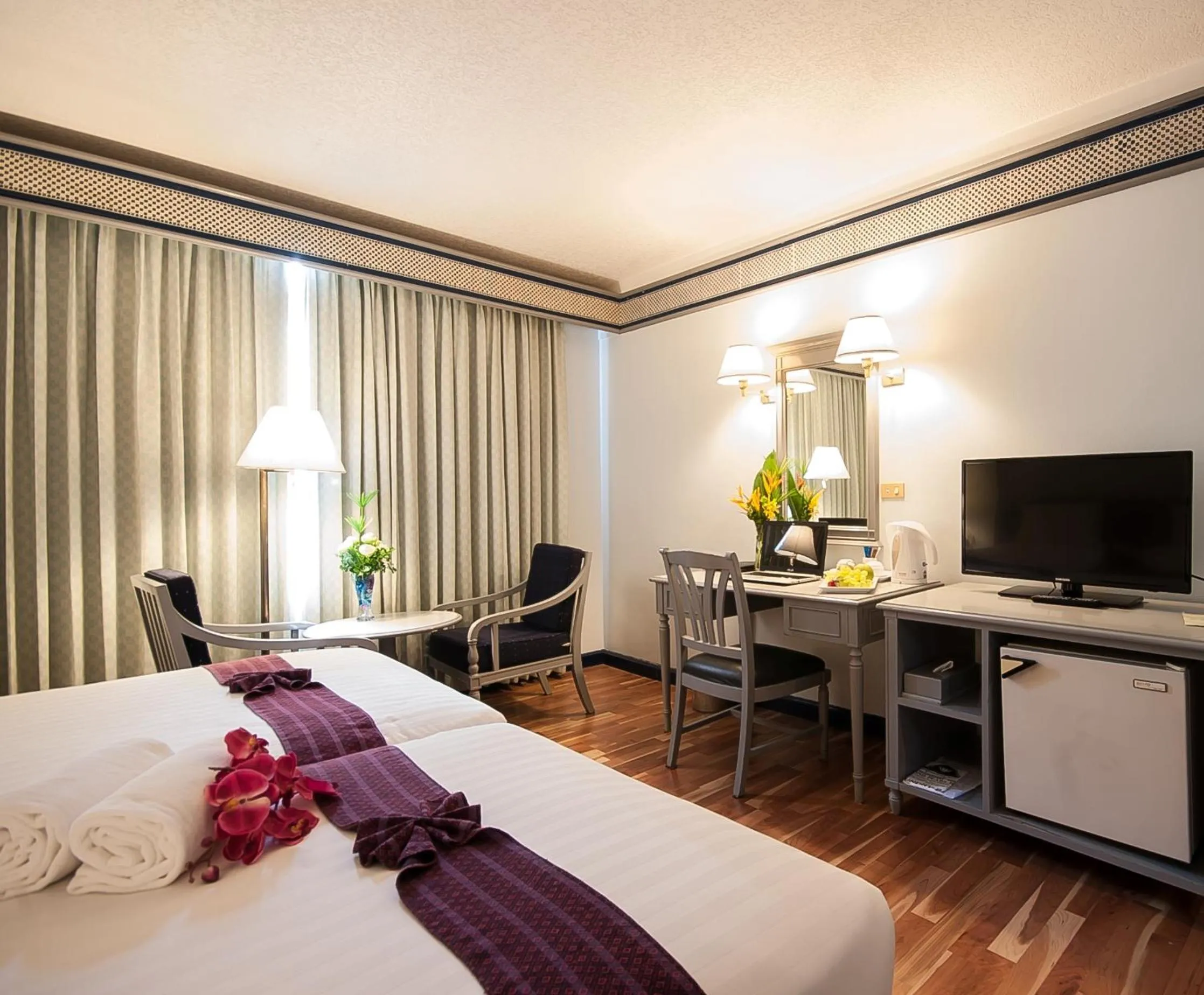 Decorative detail, Bed in Diamond Plaza Hotel