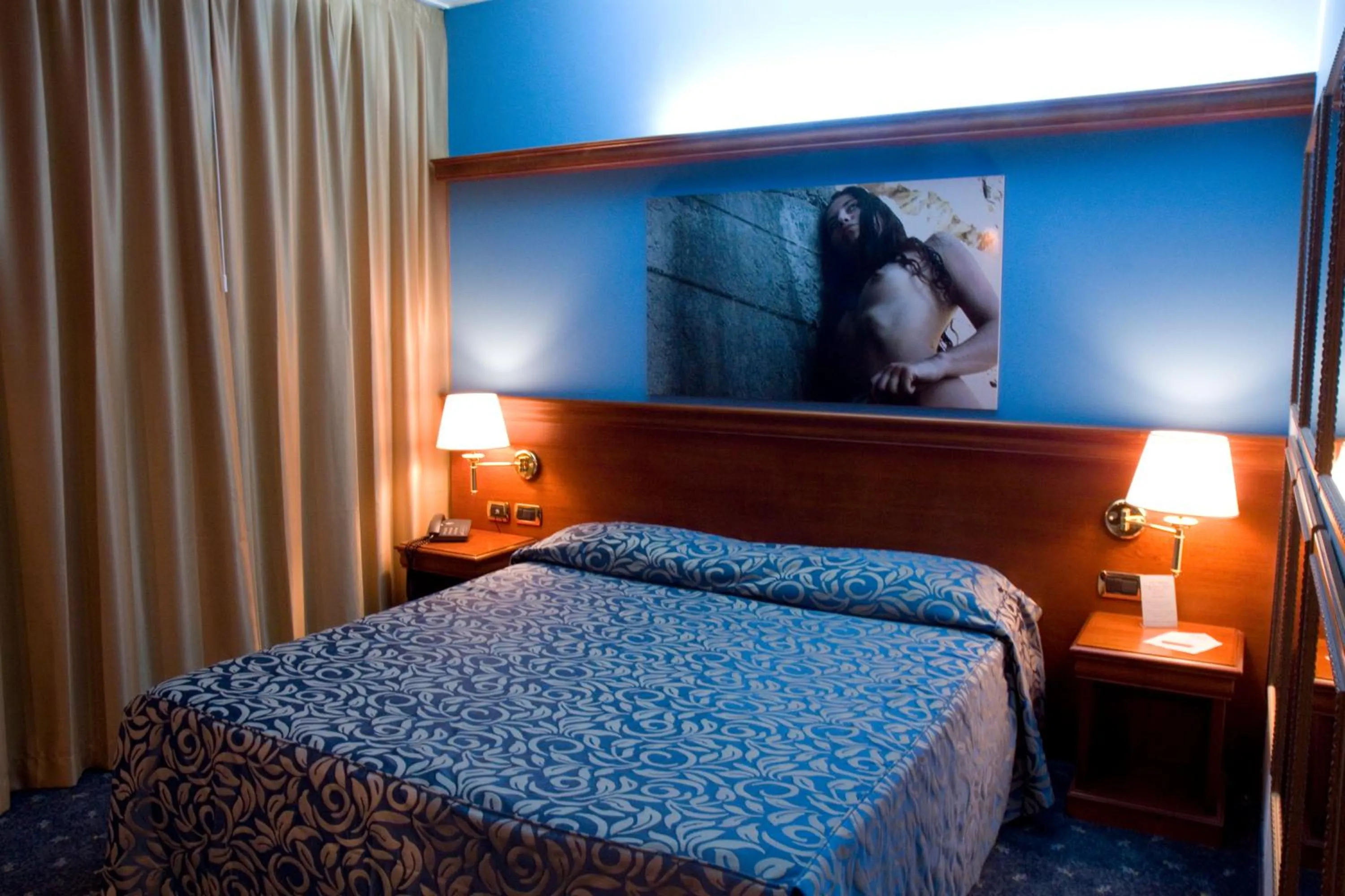 Bed in HM MotelHotel