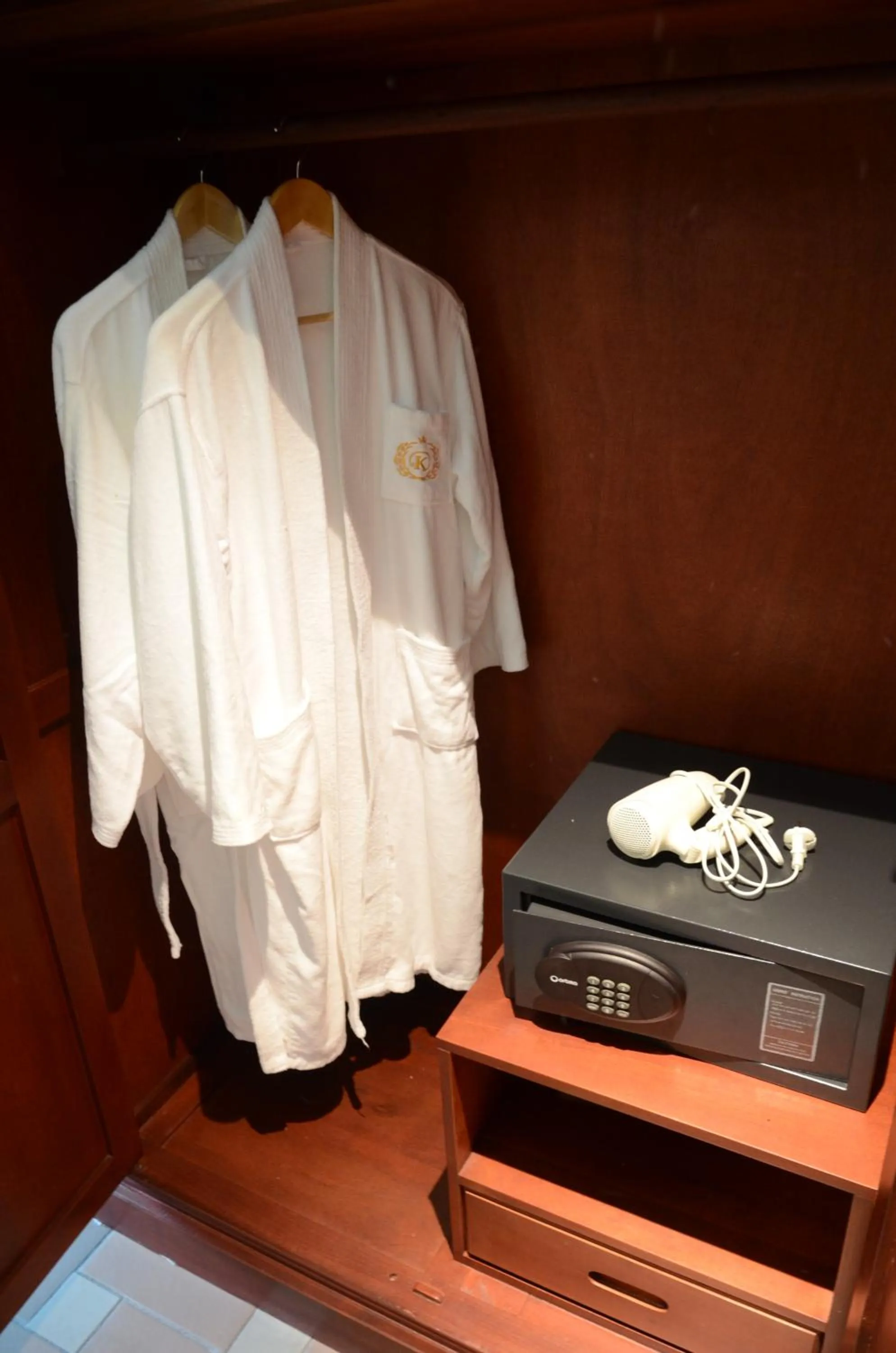 wardrobe in Saksiri Riverside Boutique Hotel