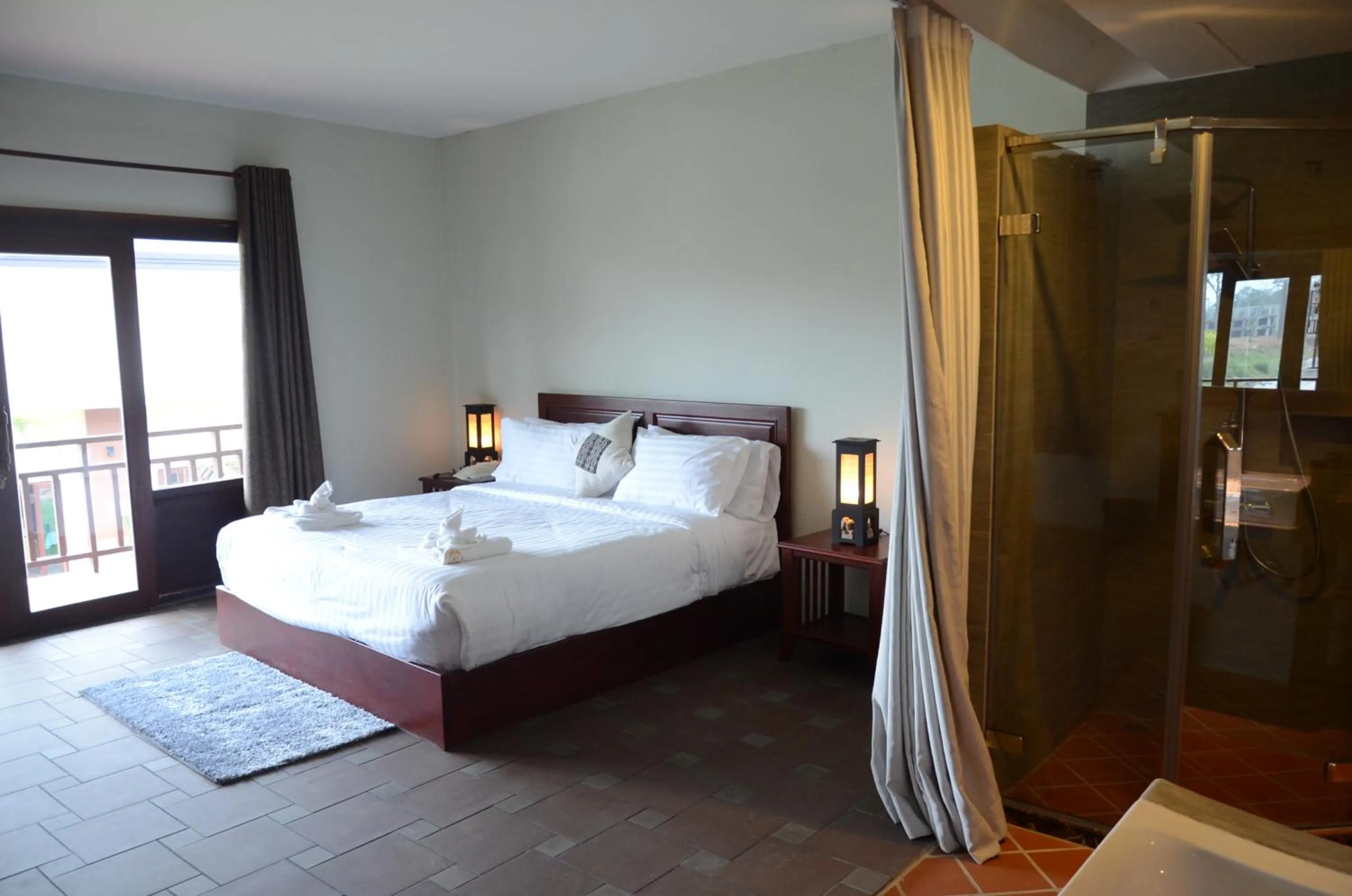 Bed in Saksiri Riverside Boutique Hotel