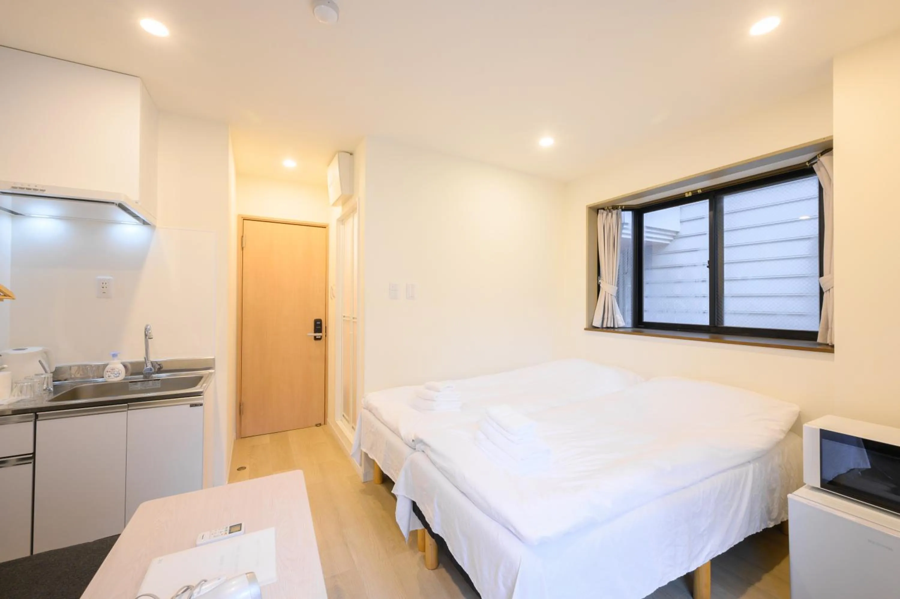 Bed in Oku Apartment