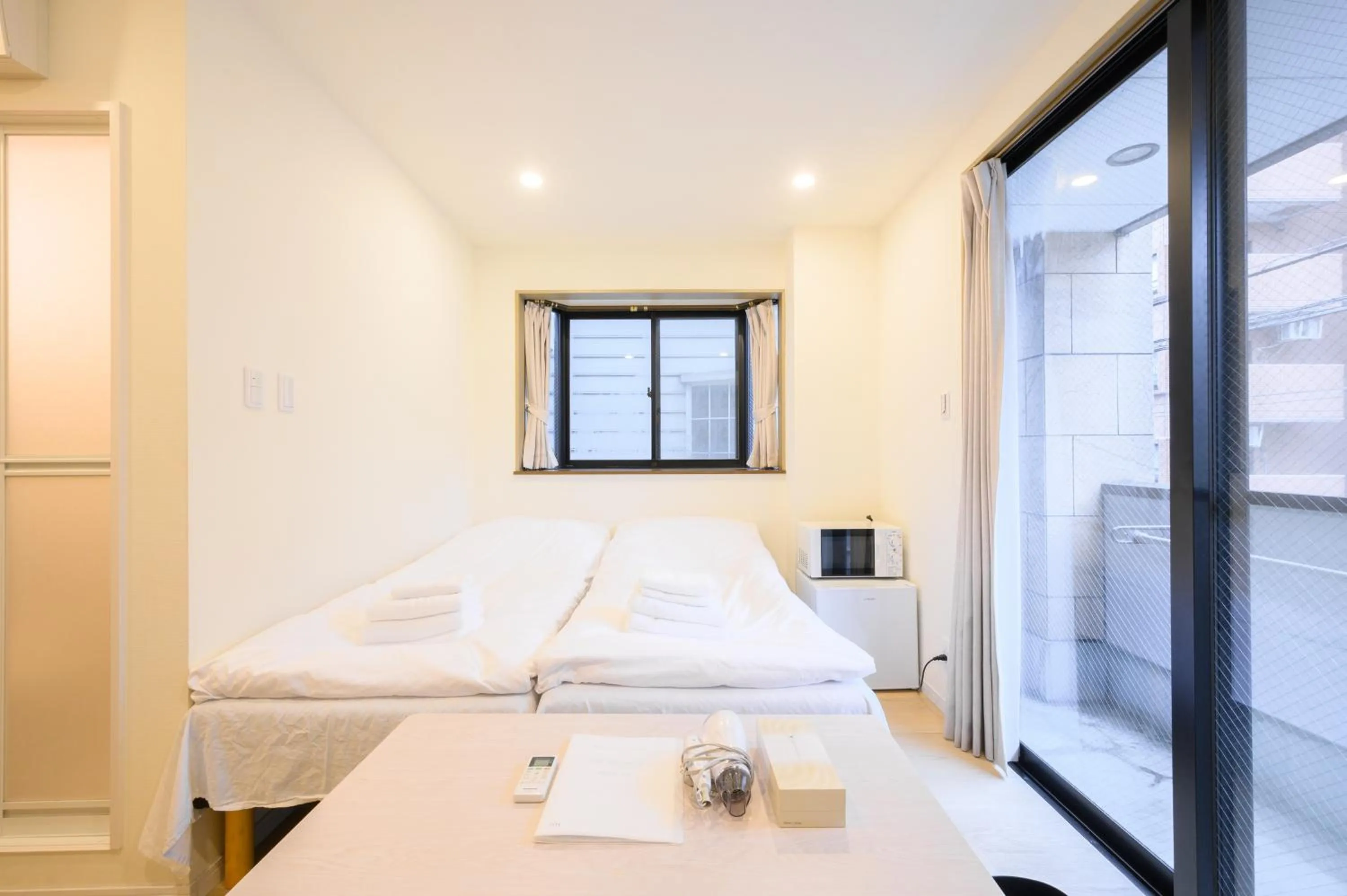 Bed in Oku Apartment