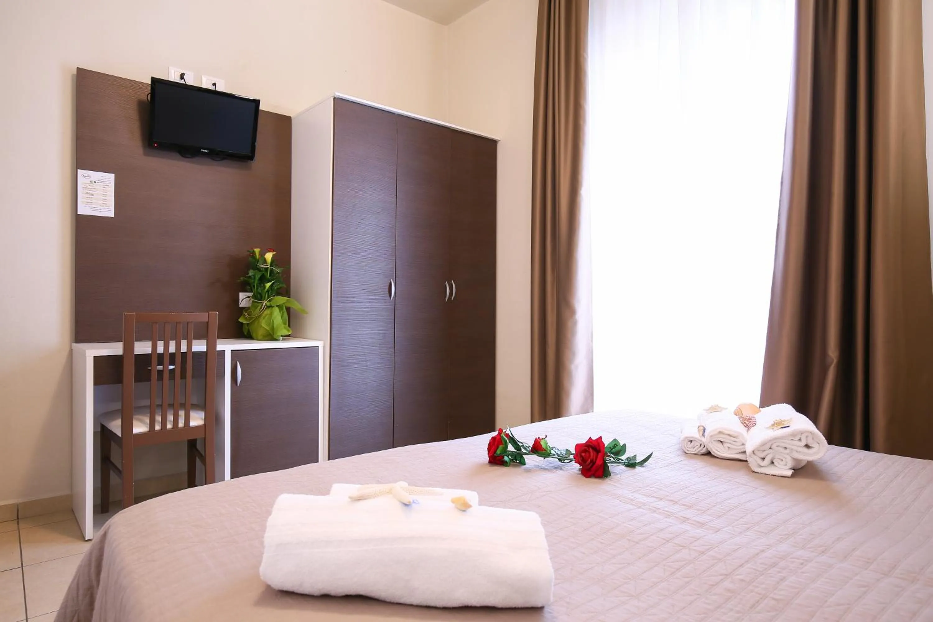 Photo of the whole room, Bed in Hotel Bergamo