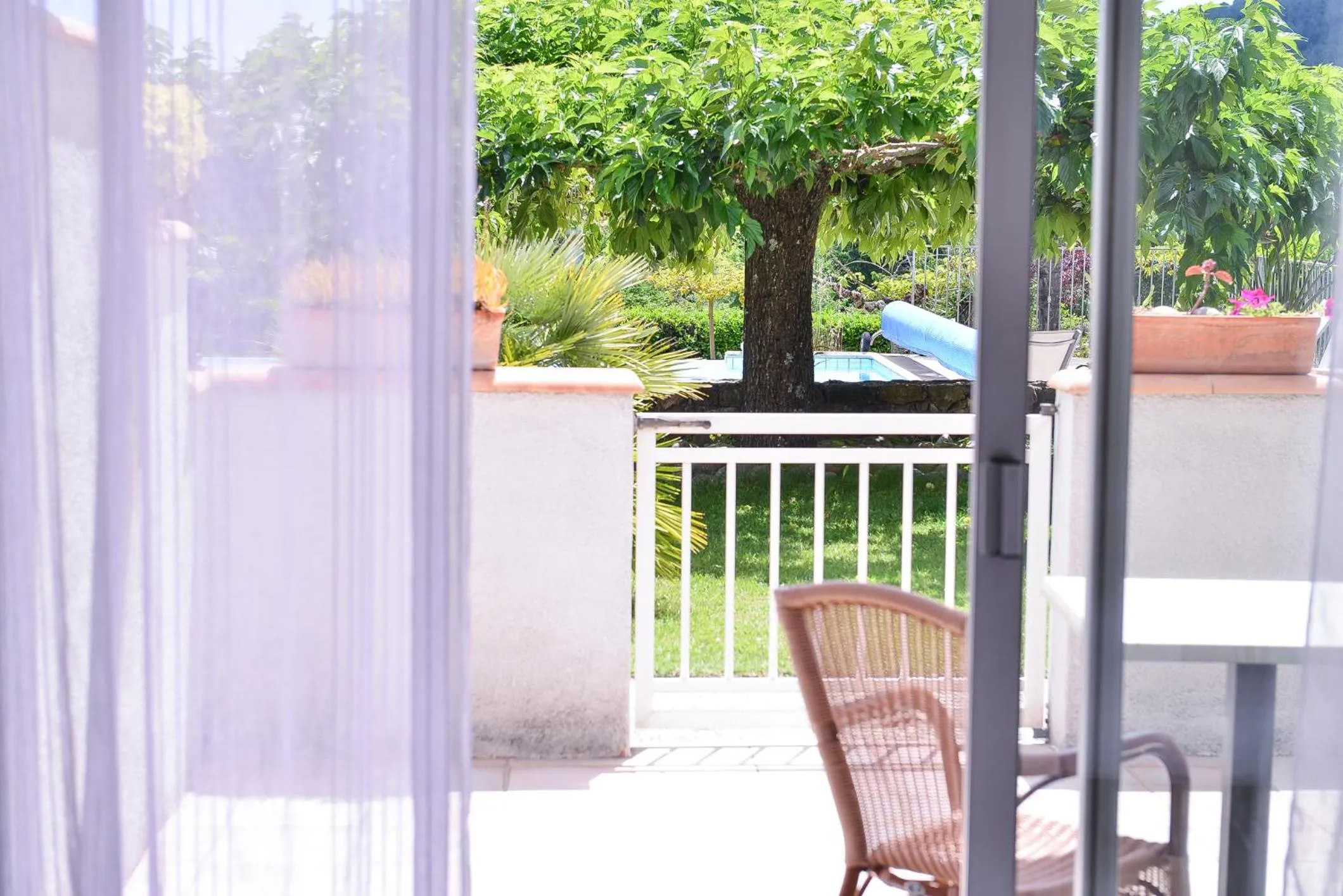 Patio in Logis Hôtel Restaurant Le Chêne Vert