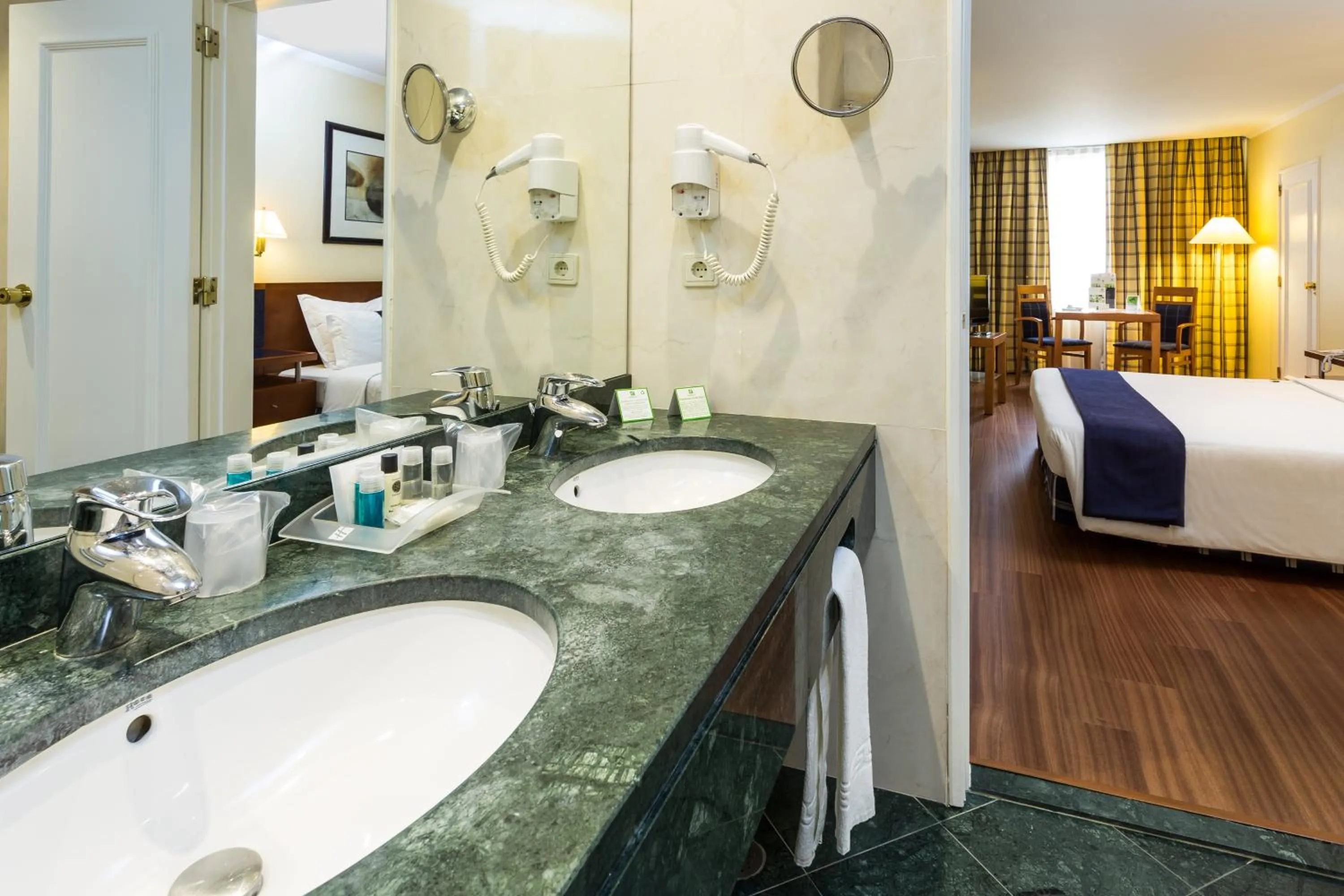Bathroom, Bed in Holiday Inn Lisbon by IHG