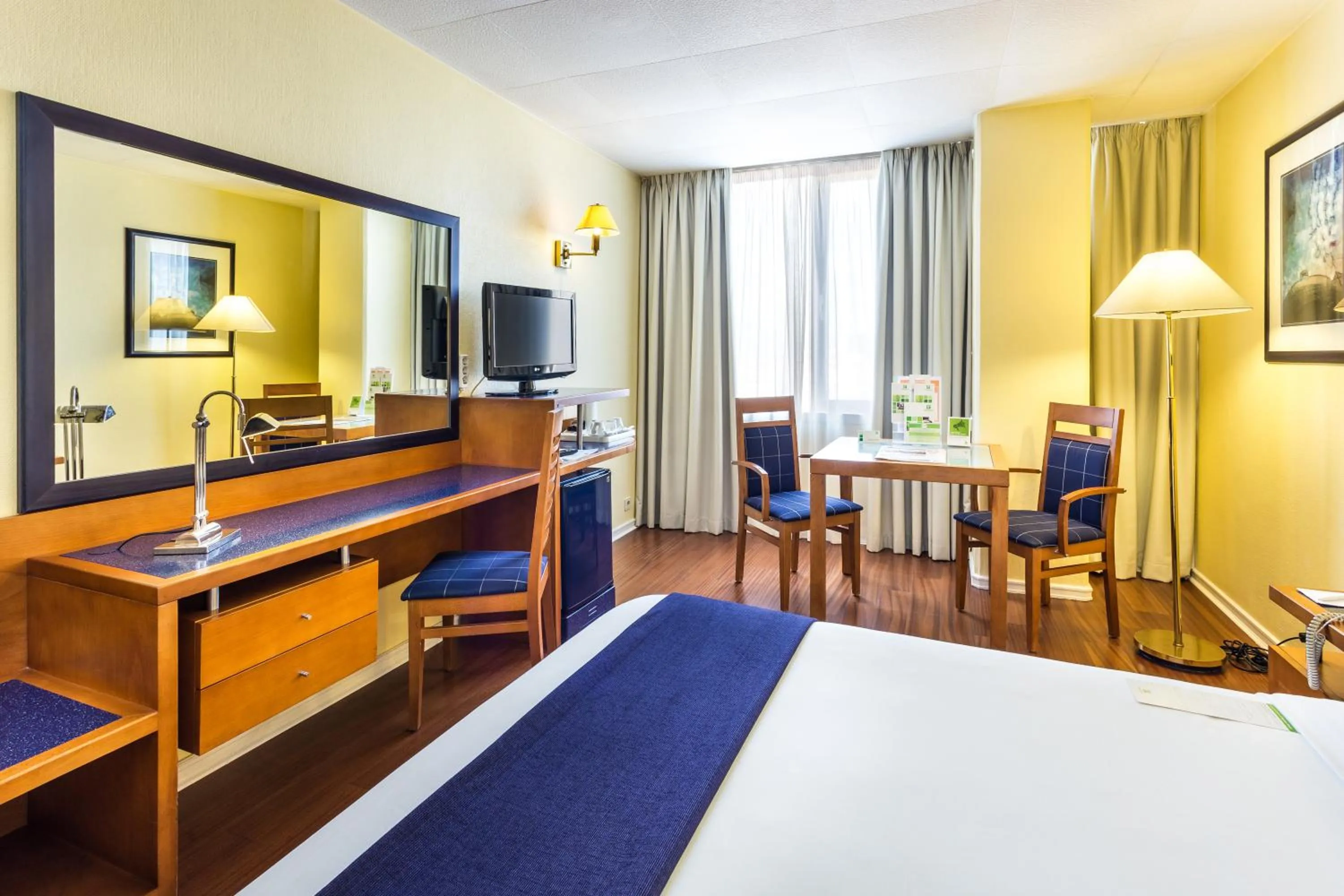 Photo of the whole room, Bed in Holiday Inn Lisbon by IHG