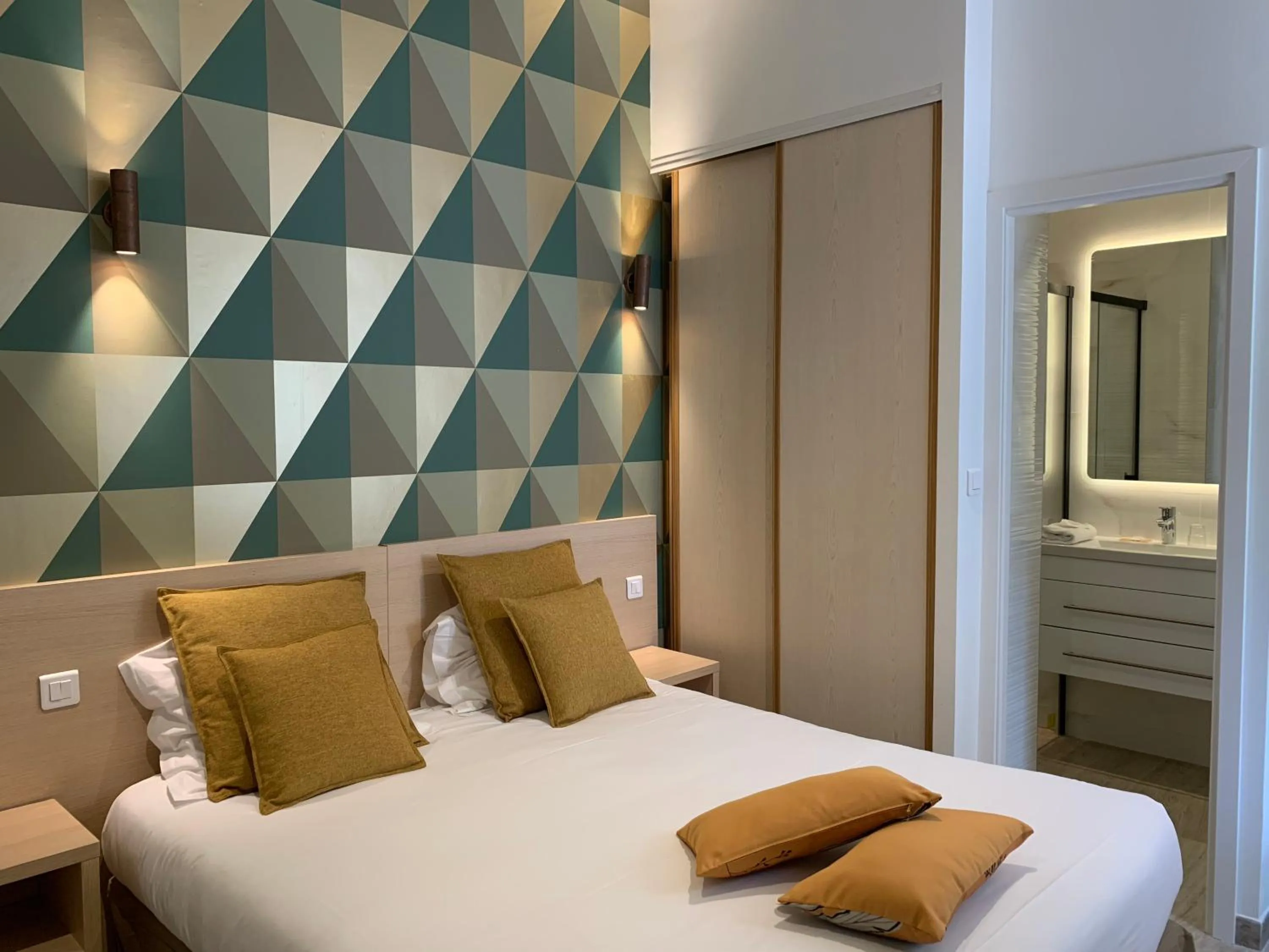 Photo of the whole room, Bed in Hôtel Le Mistral