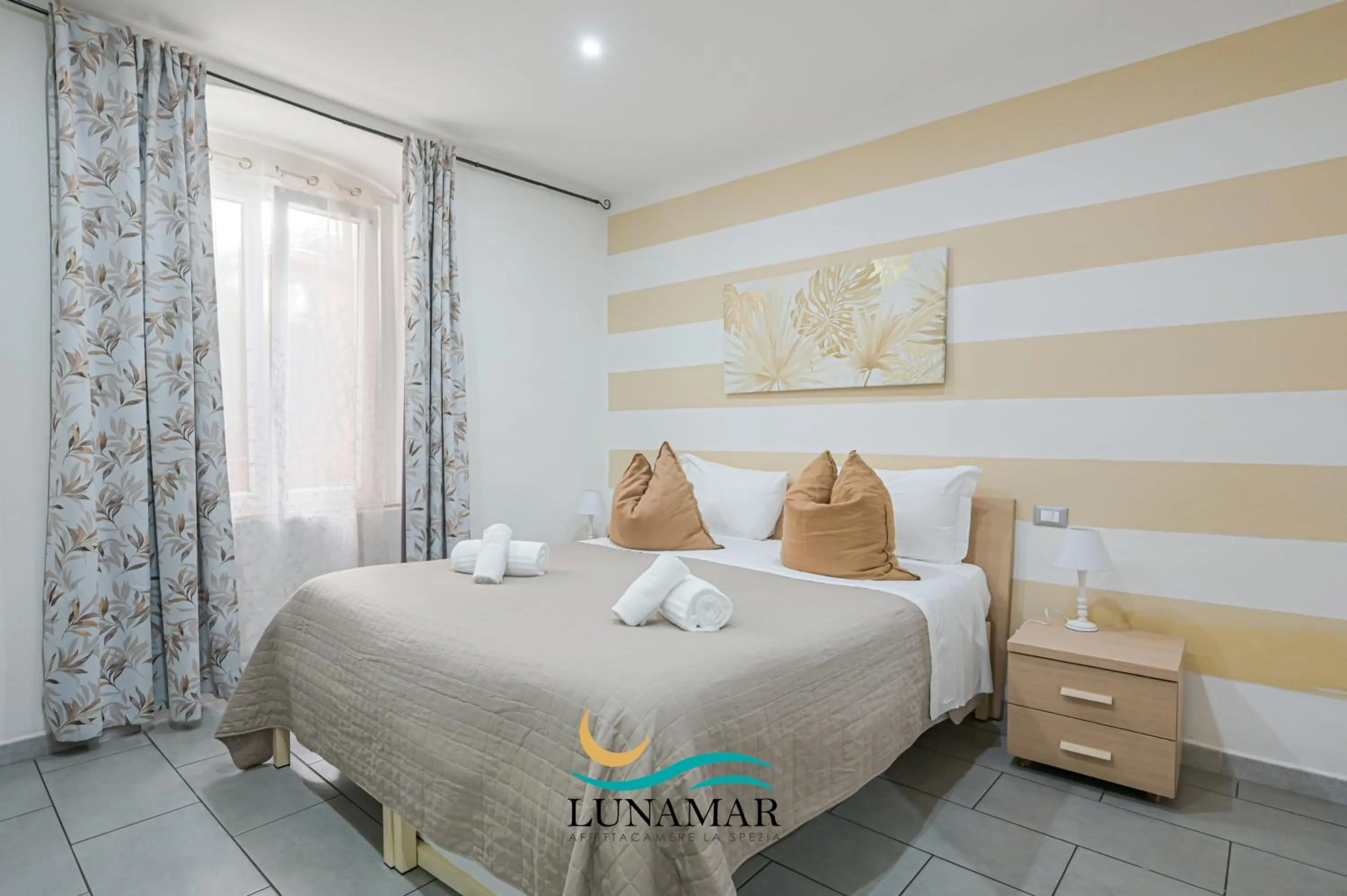 Bed in Affittacamere Lunamar