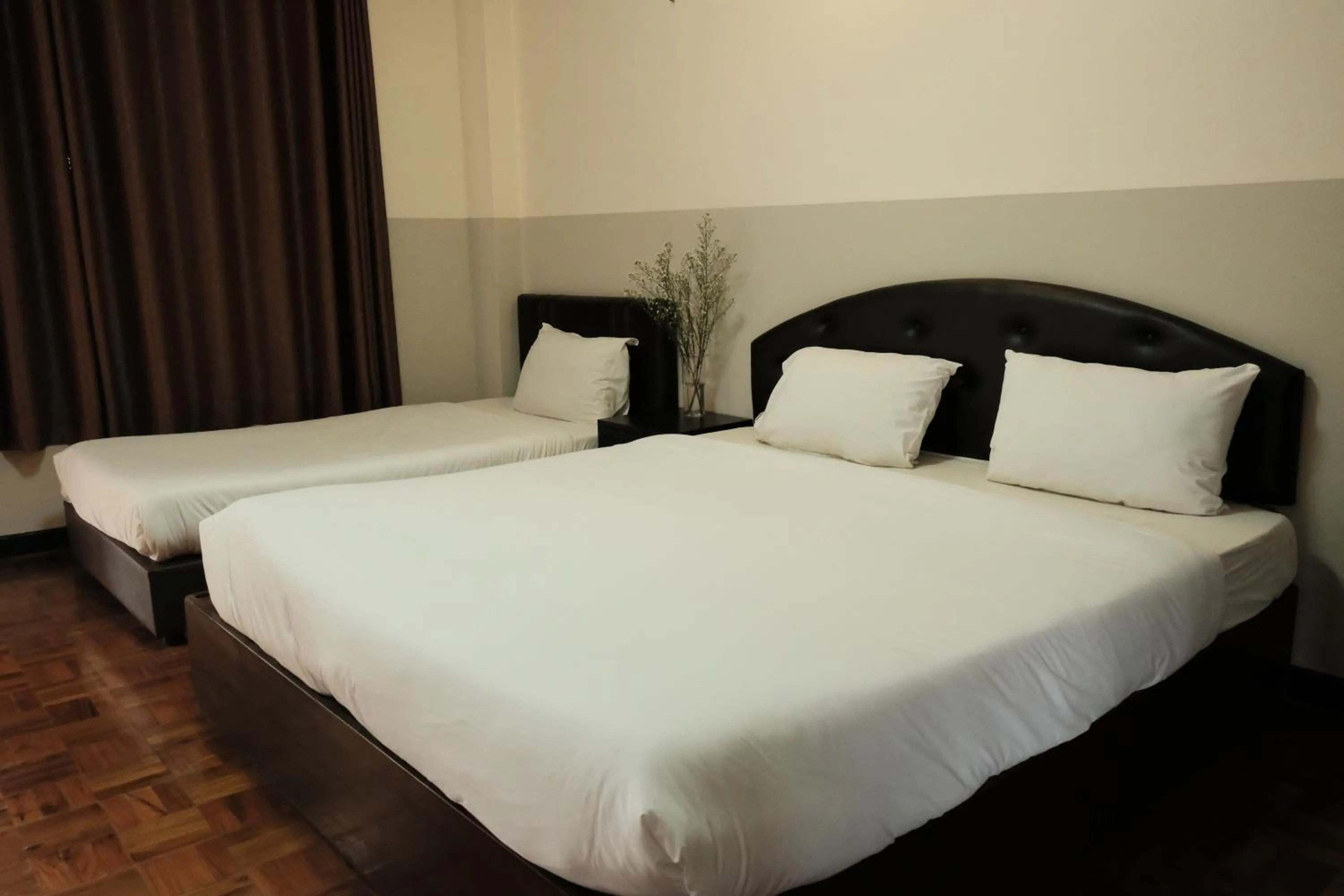 Bed in Puangpech Hotel Lampang