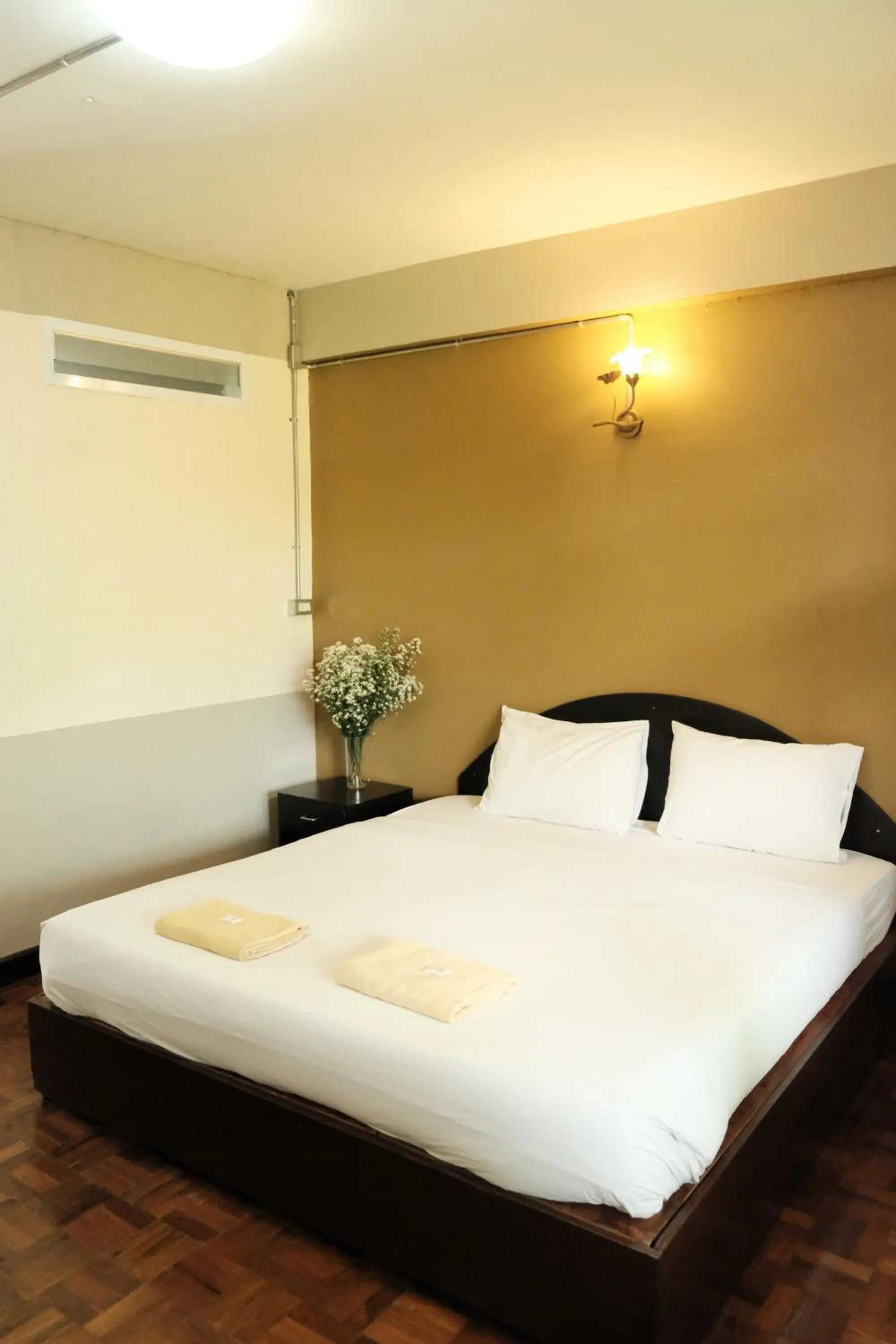 Bed in Puangpech Hotel Lampang