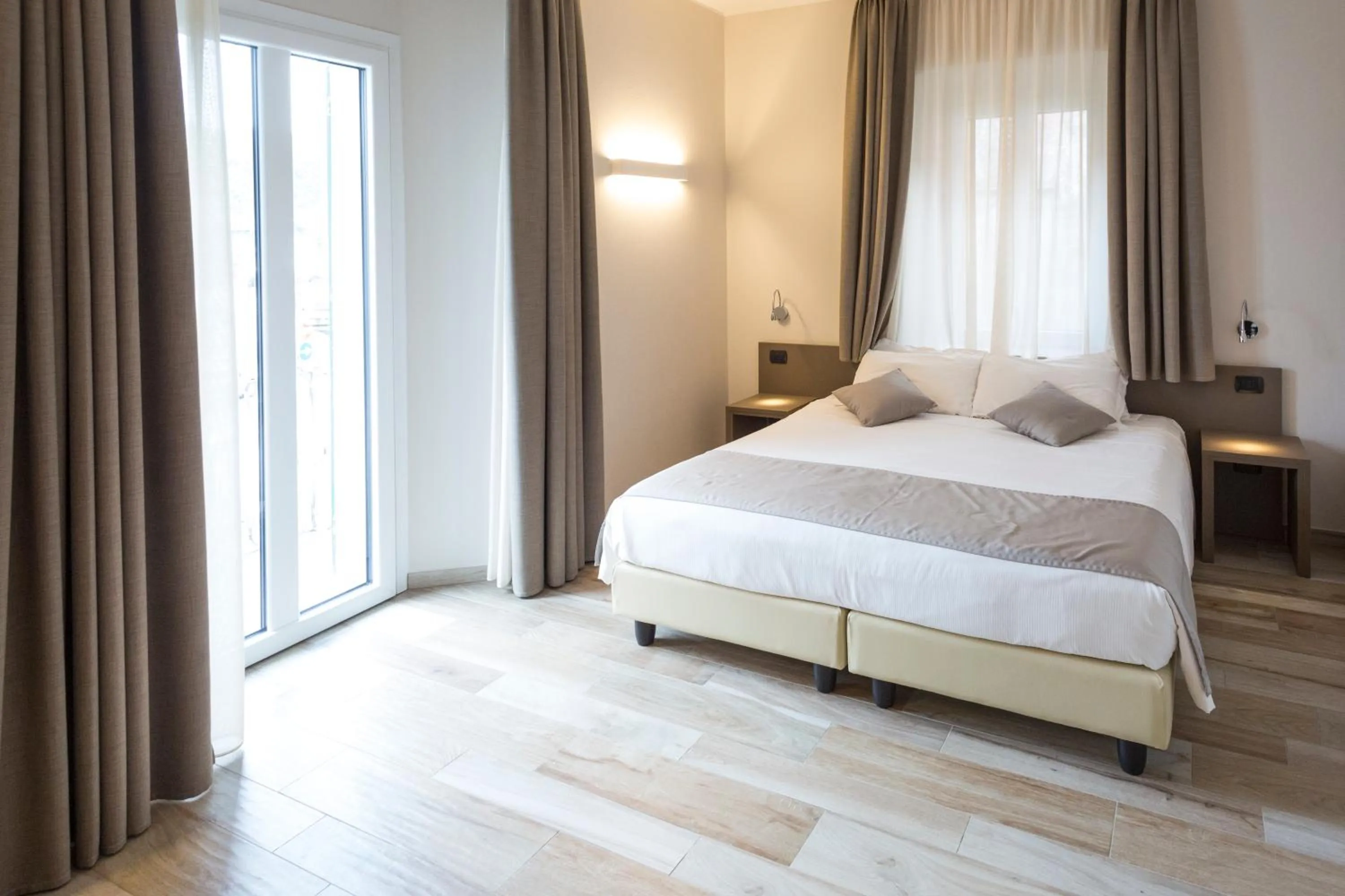 Bed in Hotel Baia di Paré