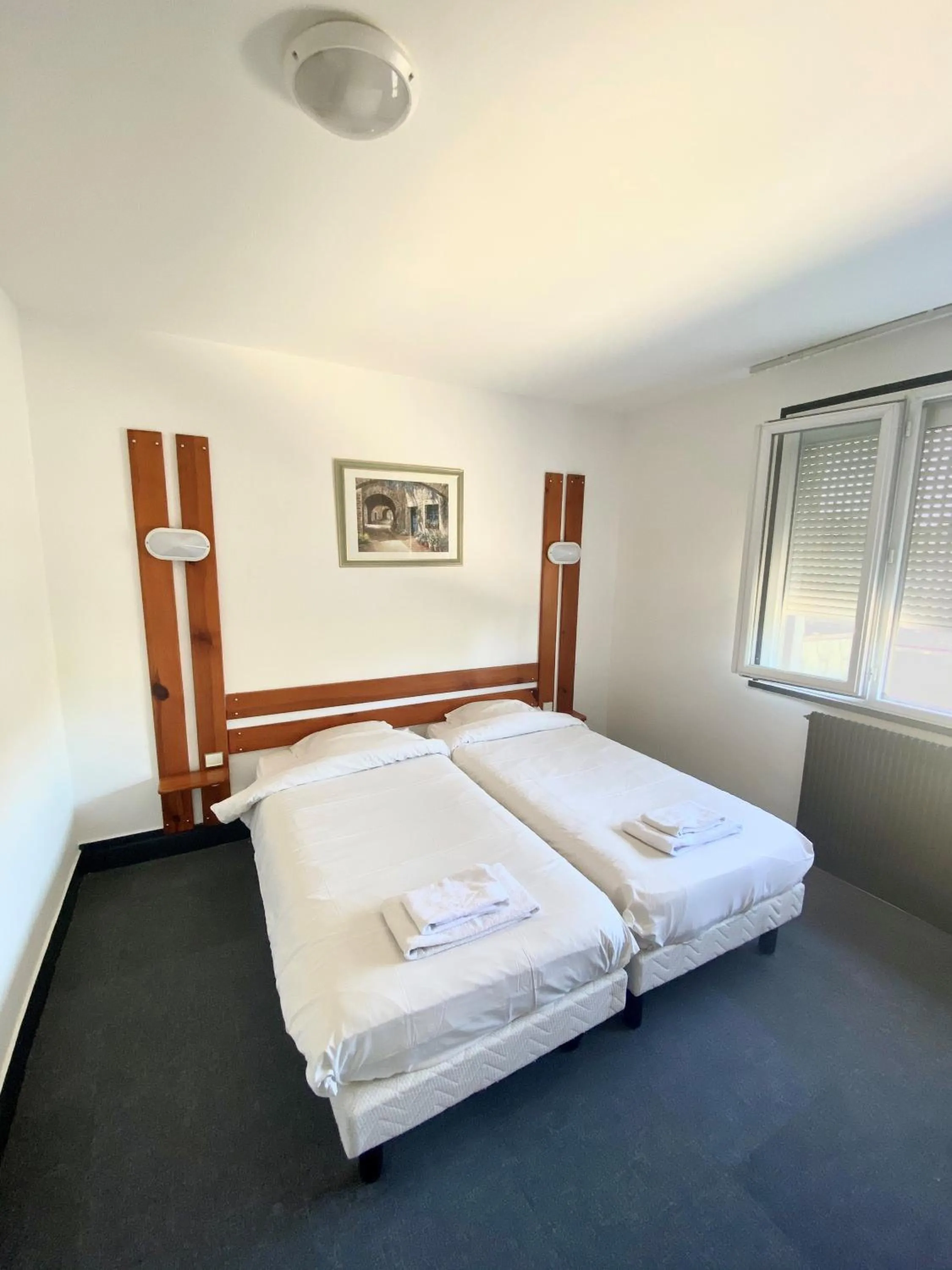 Photo of the whole room, Bed in Hotel du Centre Lucé Chartres