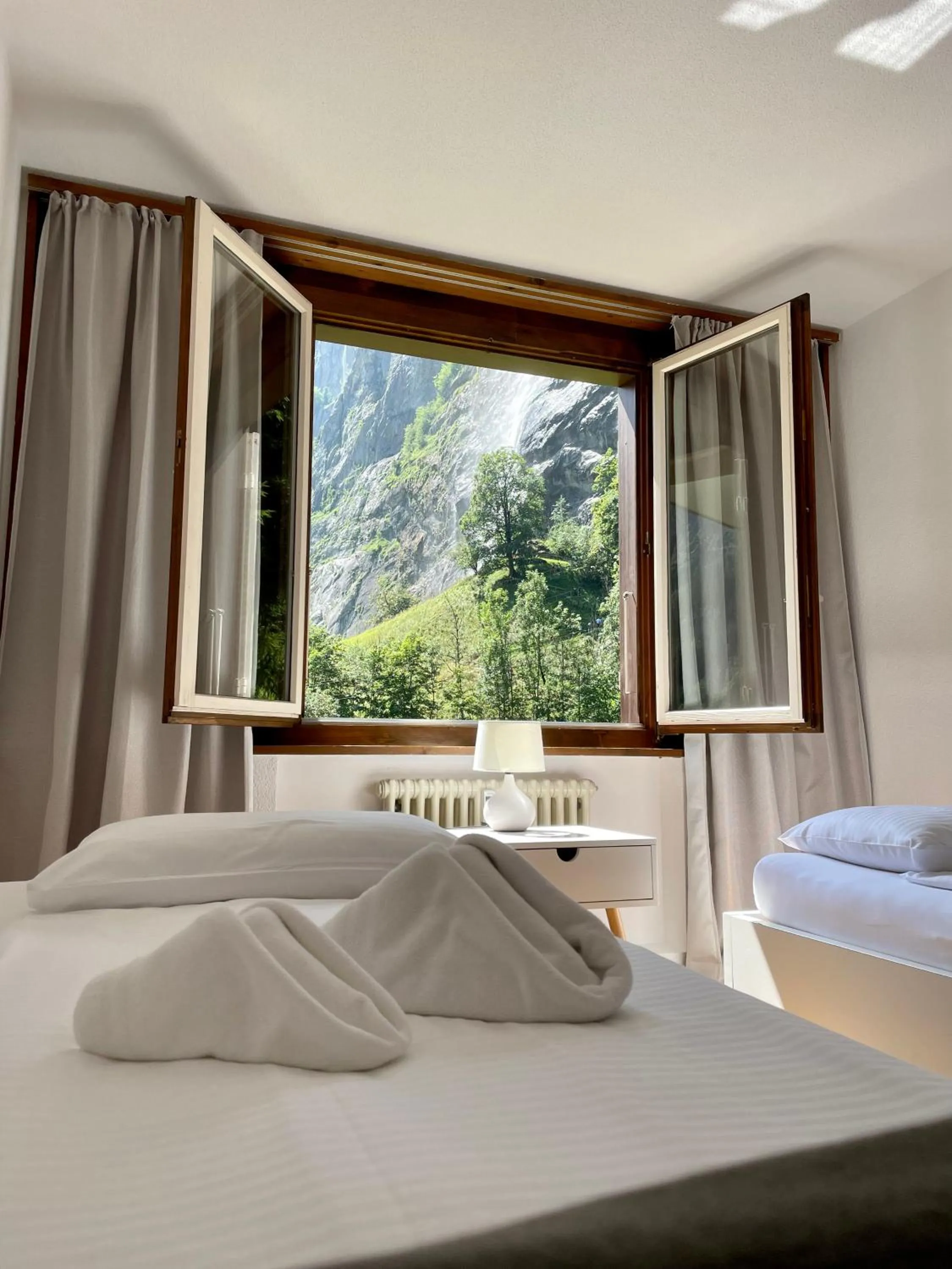 Bed in Breathtaking Waterfall Apartment
