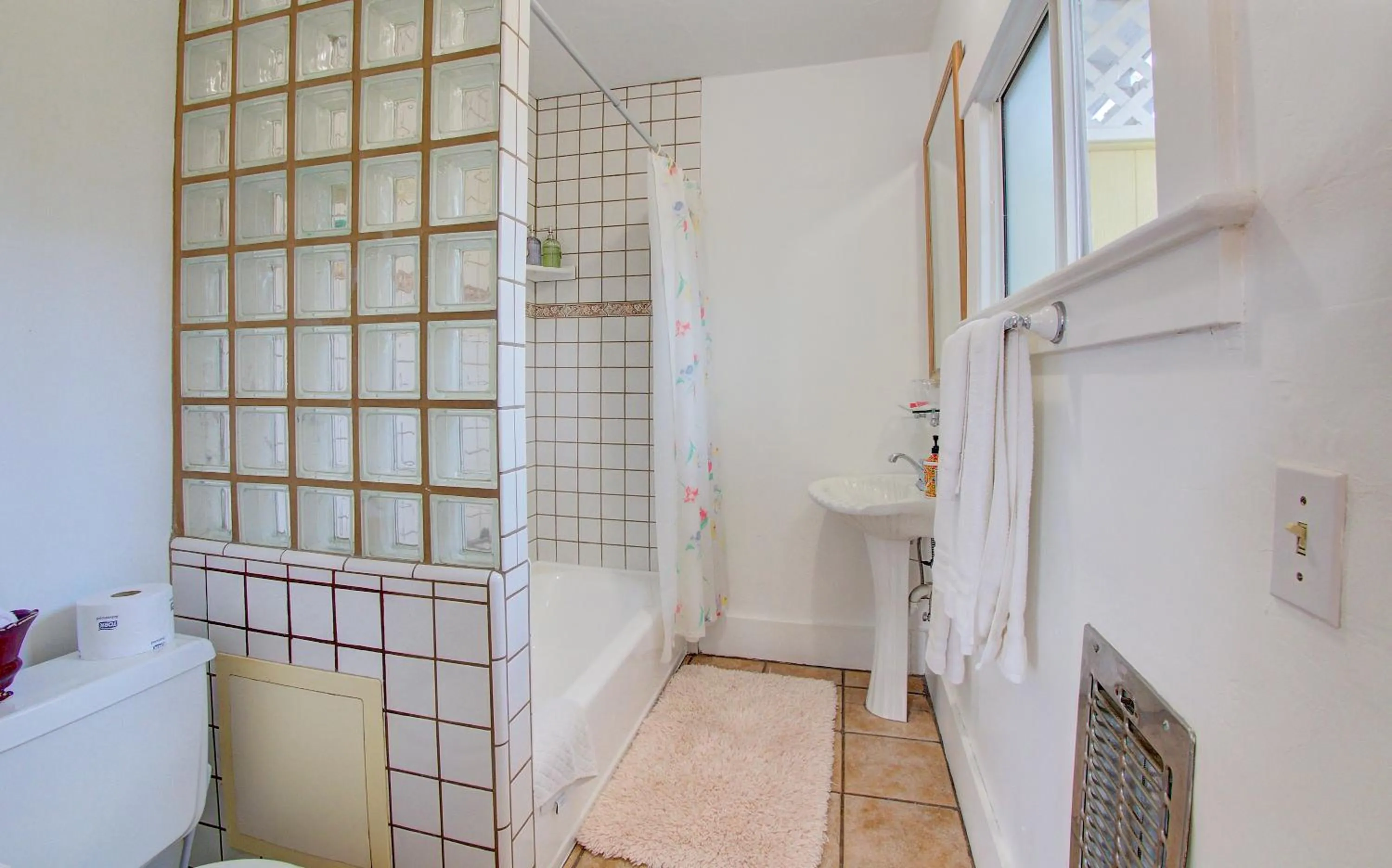 Bathroom in Secret Garden Inn & Cottages