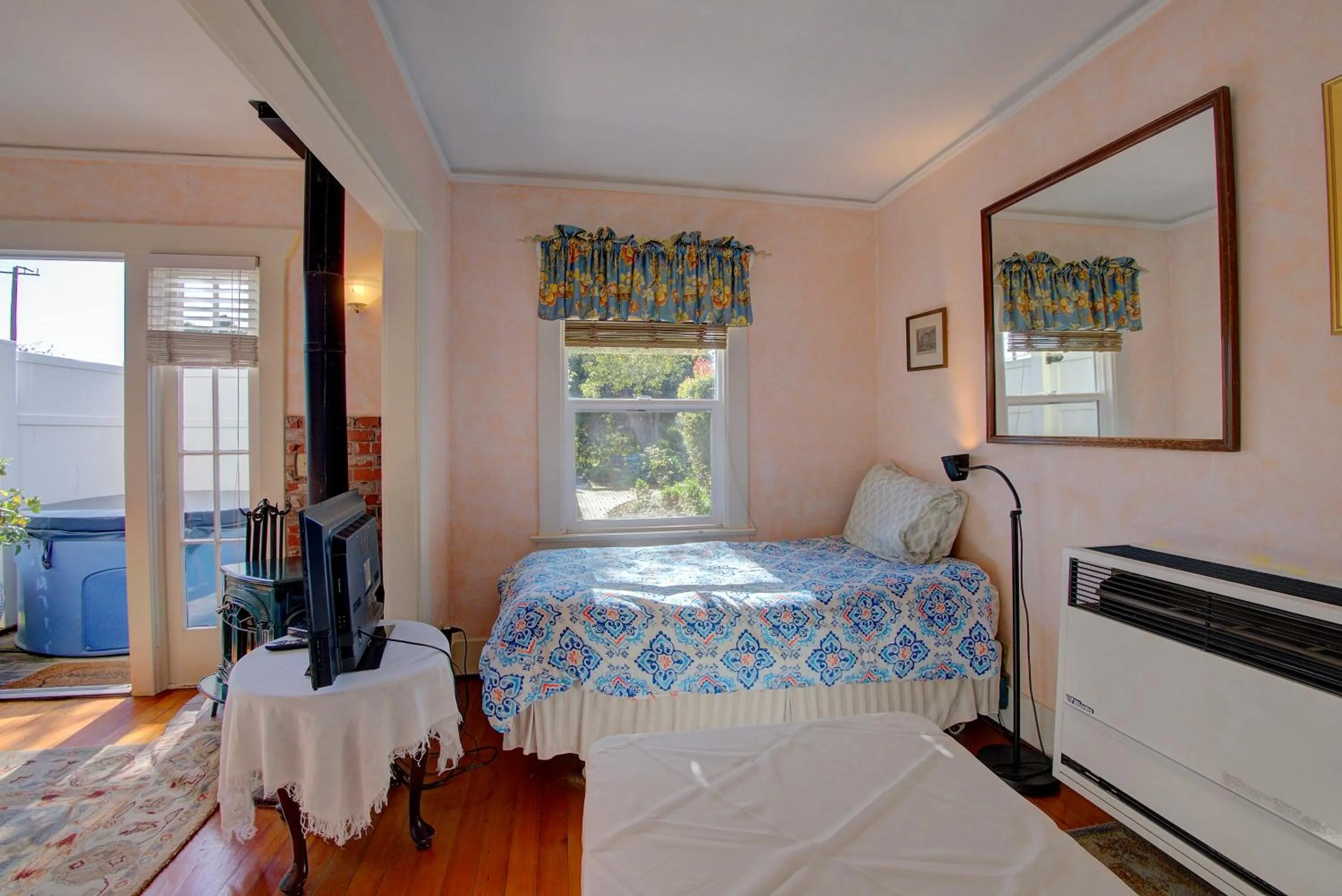 Bedroom, Bed in Secret Garden Inn & Cottages