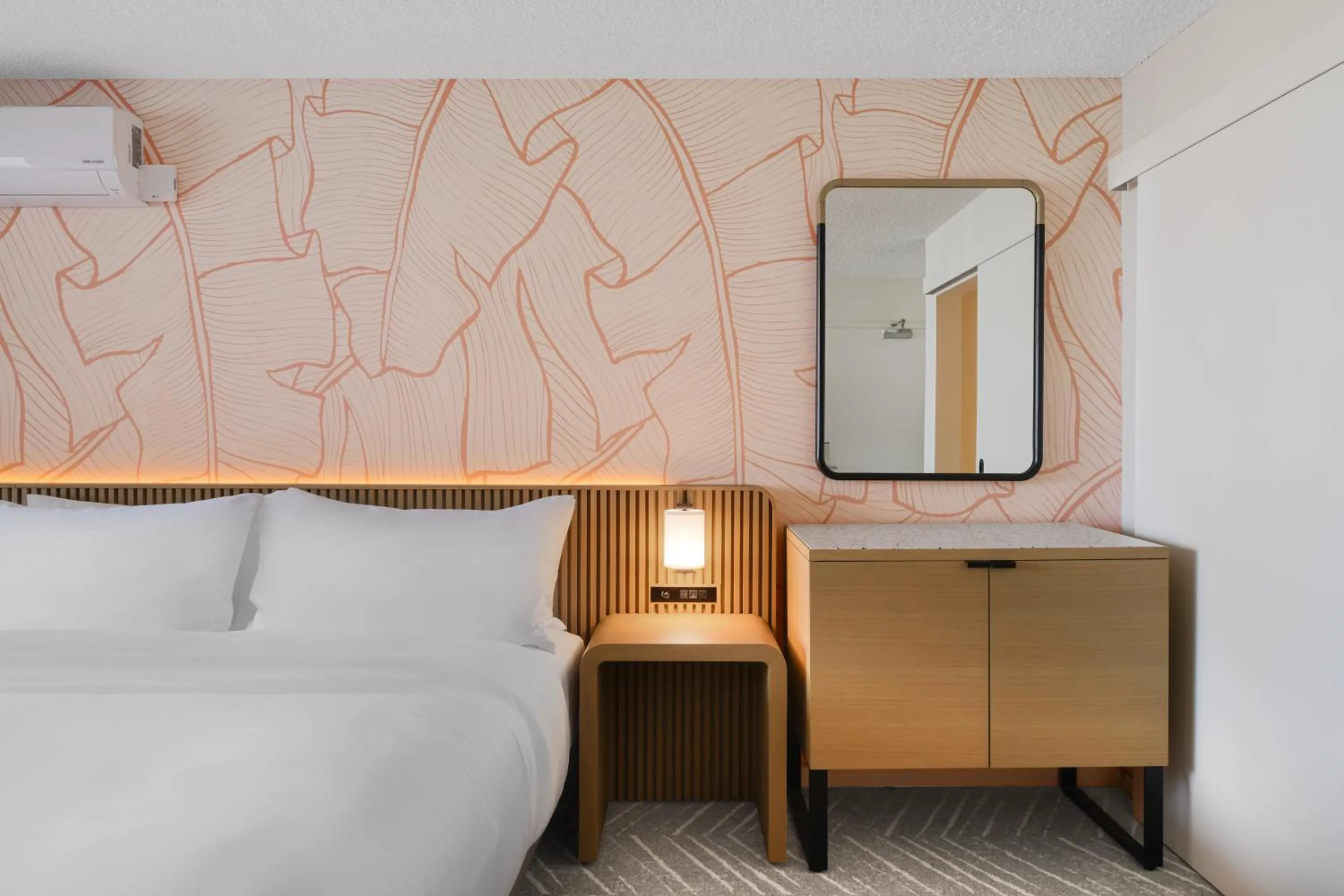 Bed in The Ambassador of Waikiki, Tapestry Collection by Hilton