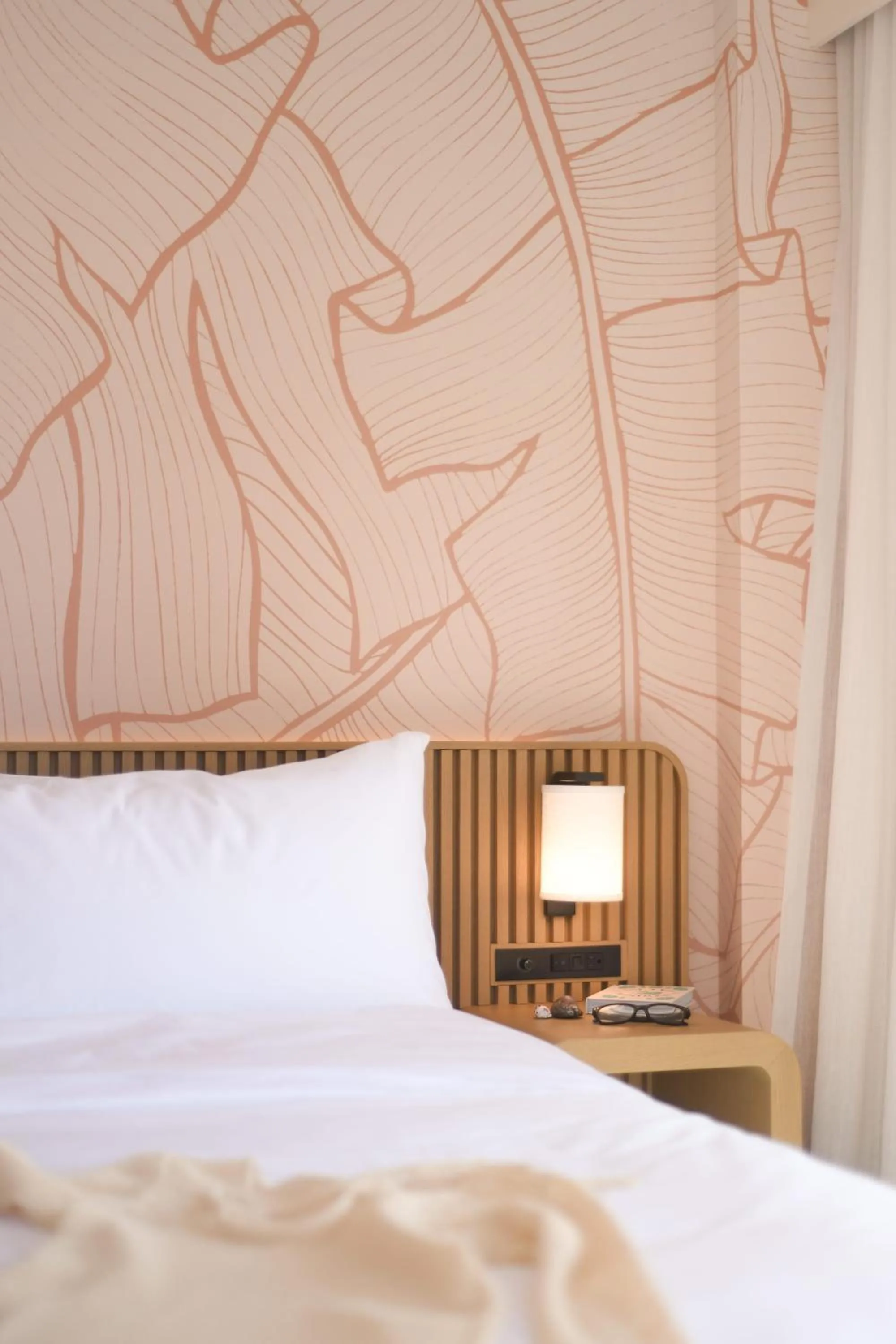 Bed in The Ambassador of Waikiki, Tapestry Collection by Hilton