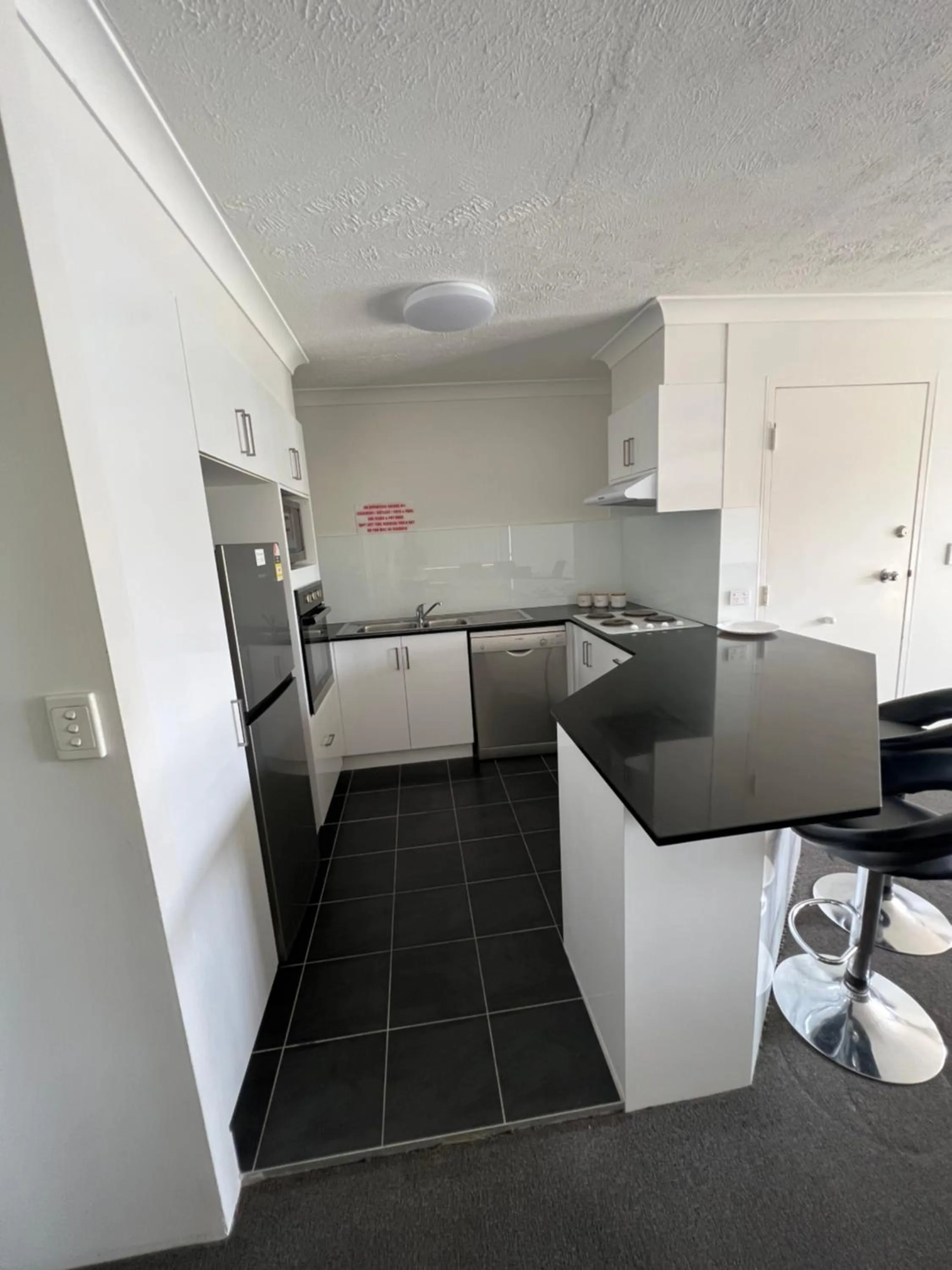 Kitchen or kitchenette in Cascade Gardens Apartments