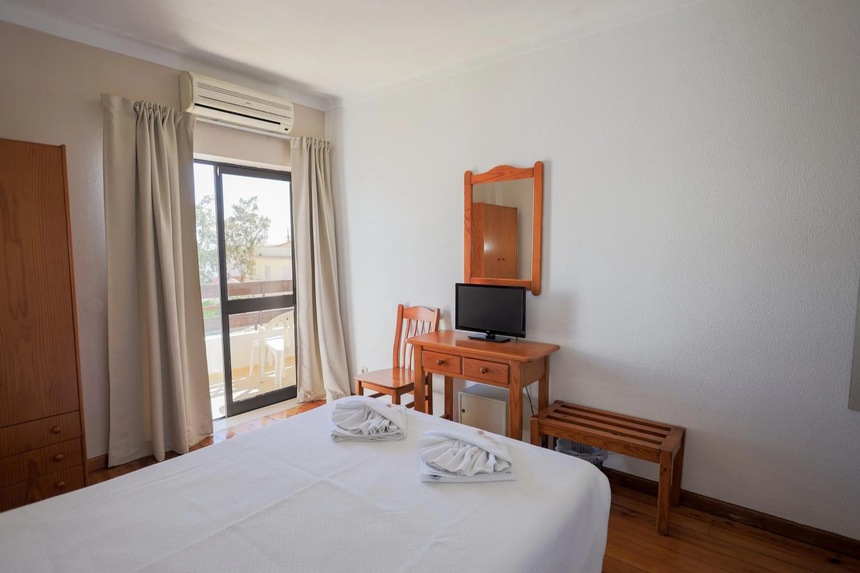 Bedroom in Portimão Center Hotel by Umbral