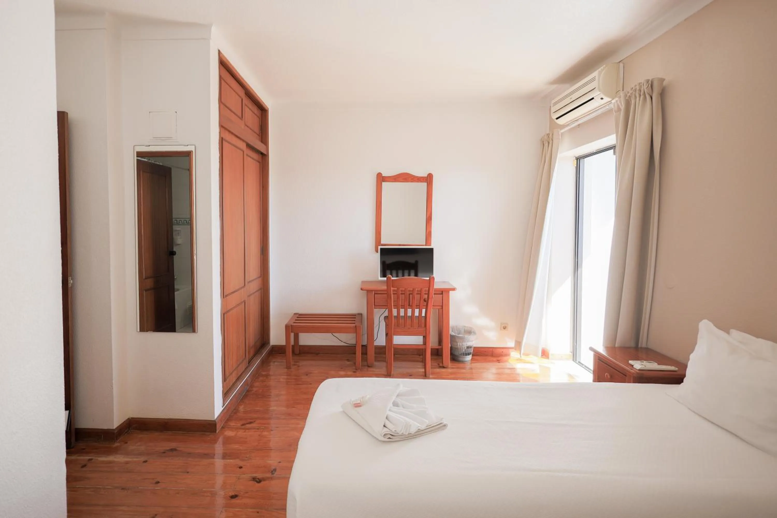 Bed in Portimão Center Hotel by Umbral