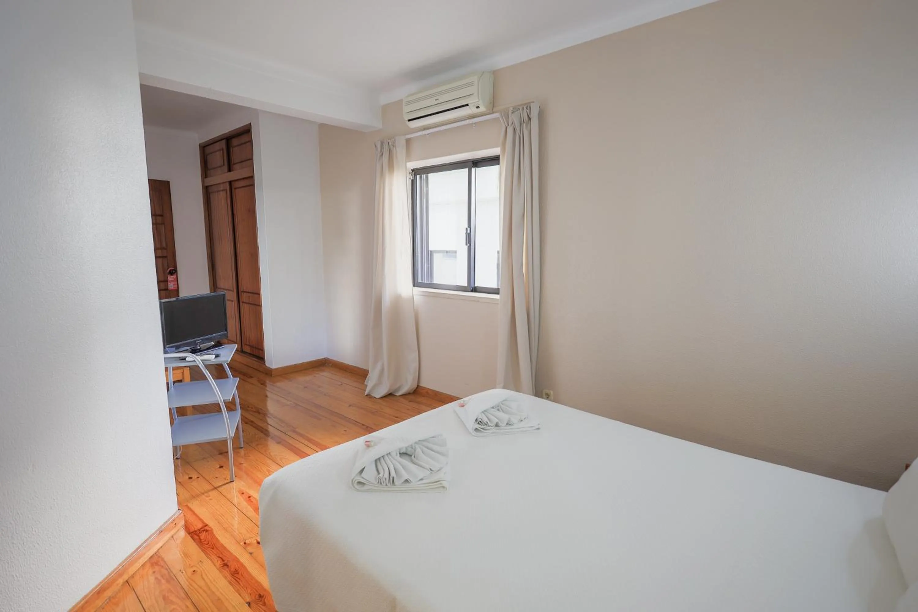 Bed in Portimão Center Hotel by Umbral