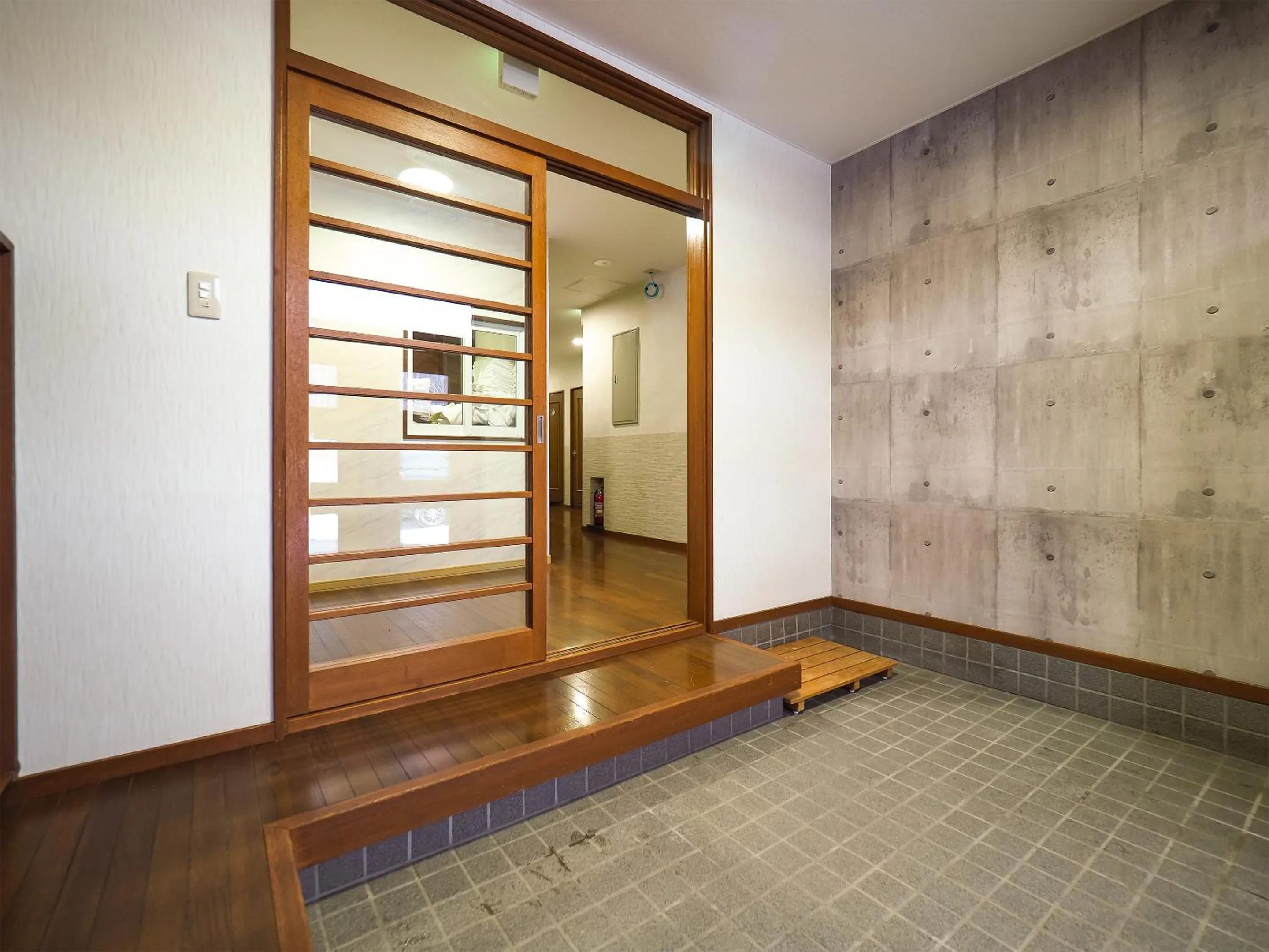 Facade/entrance in Petit Hotel Gracey Tomamu