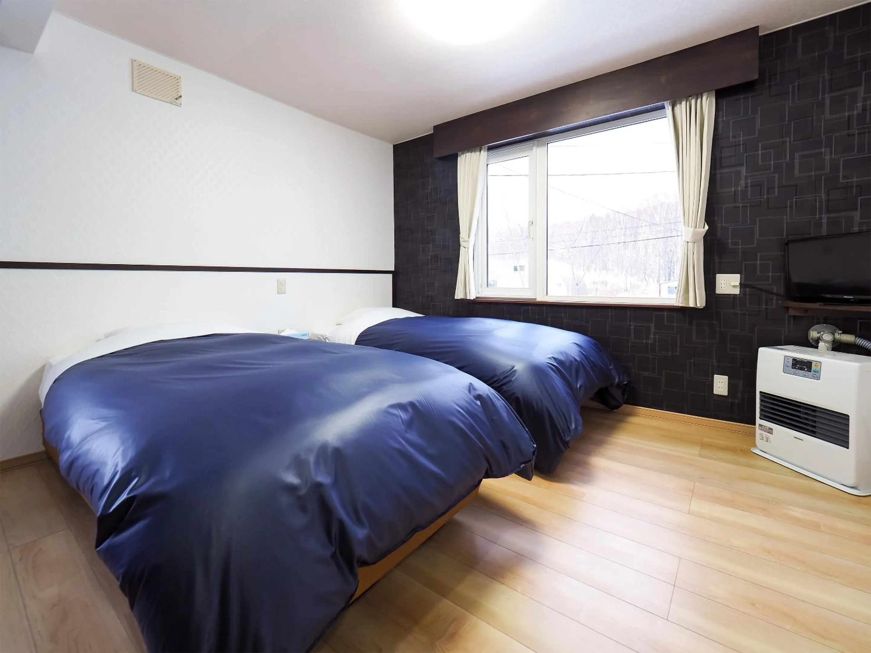 Photo of the whole room in Petit Hotel Gracey Tomamu