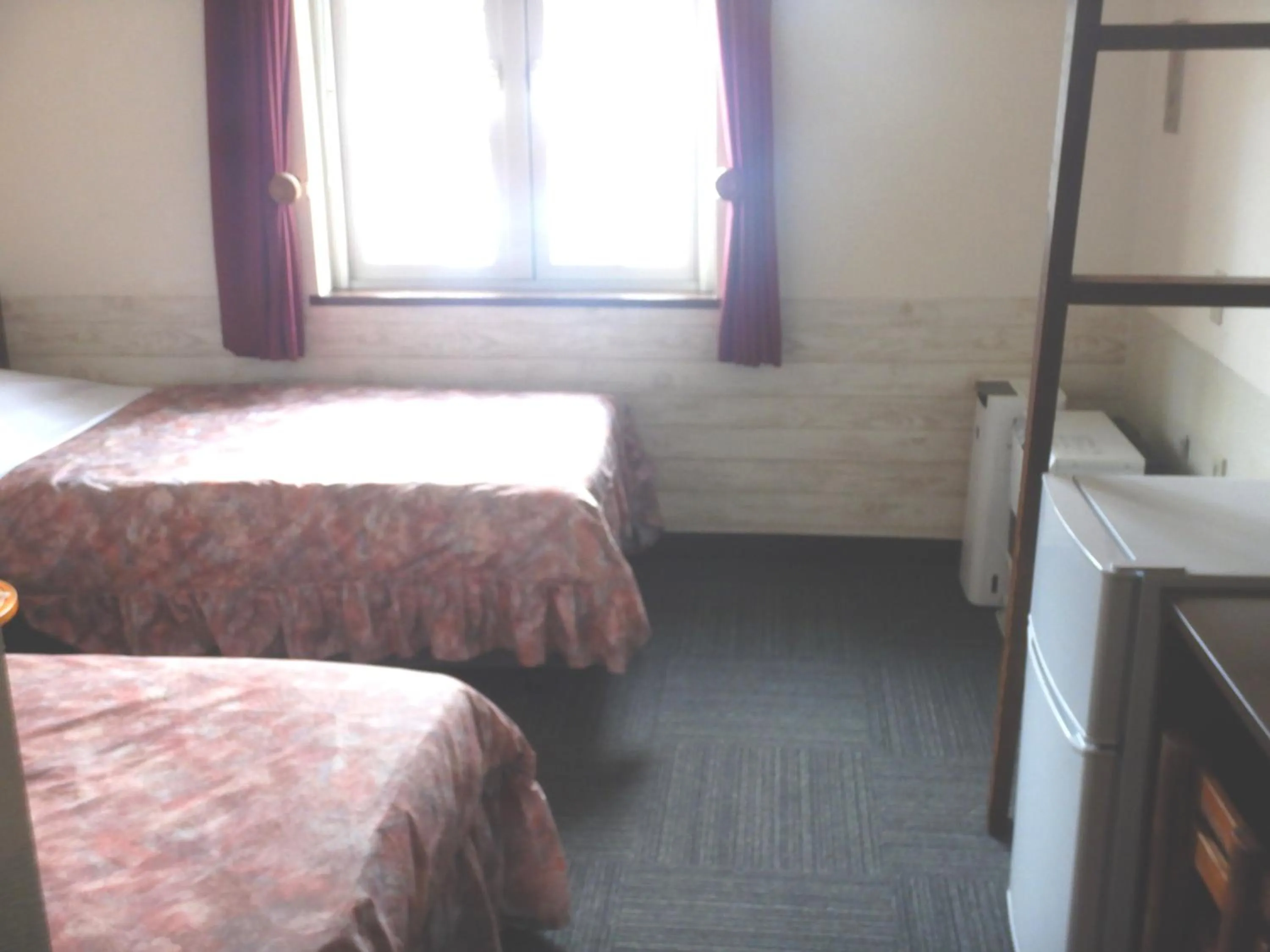 Photo of the whole room, Bed in Petit Hotel Gracey Tomamu