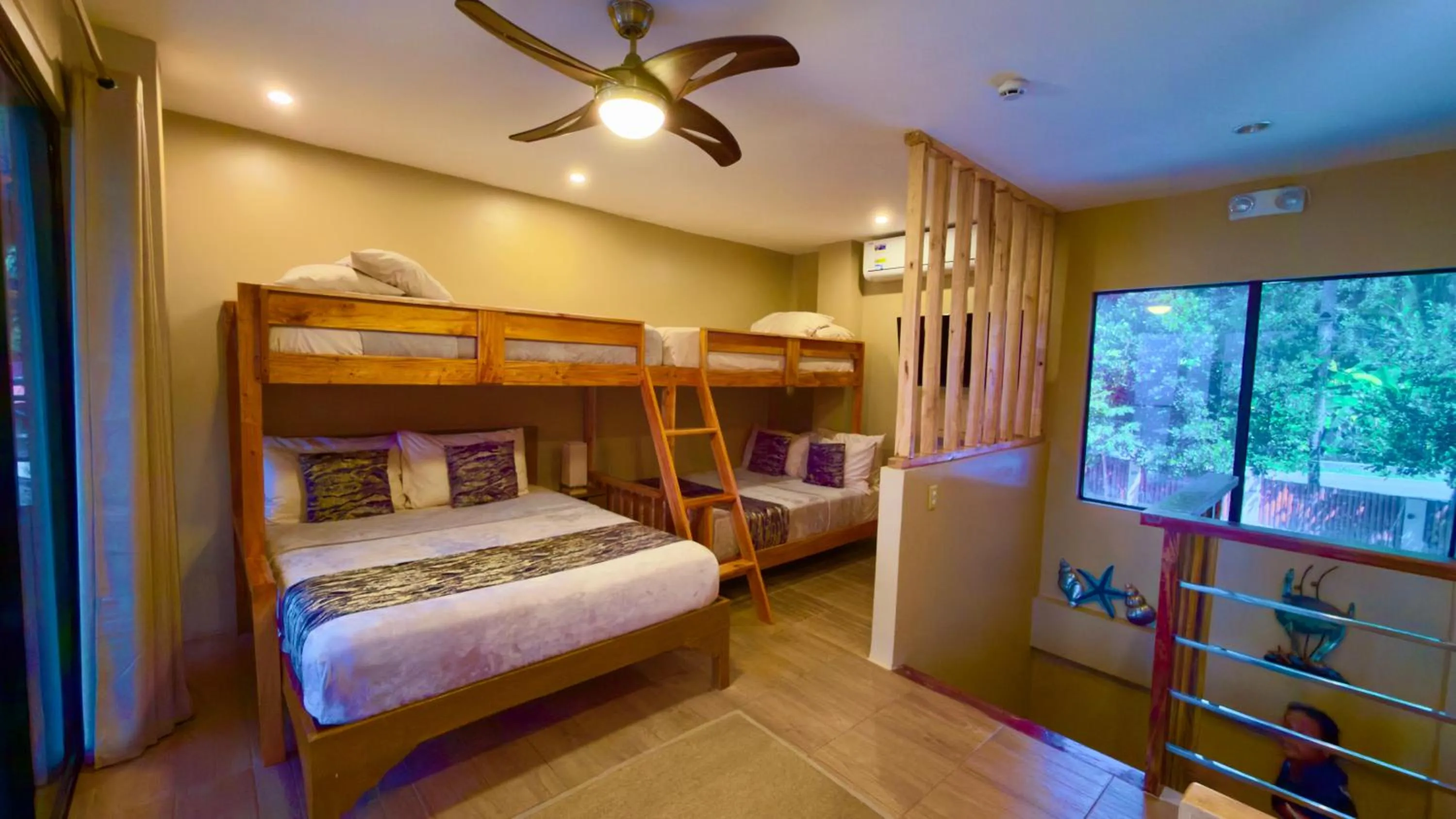 Bed in Southseas Beach Resort and Dive Center