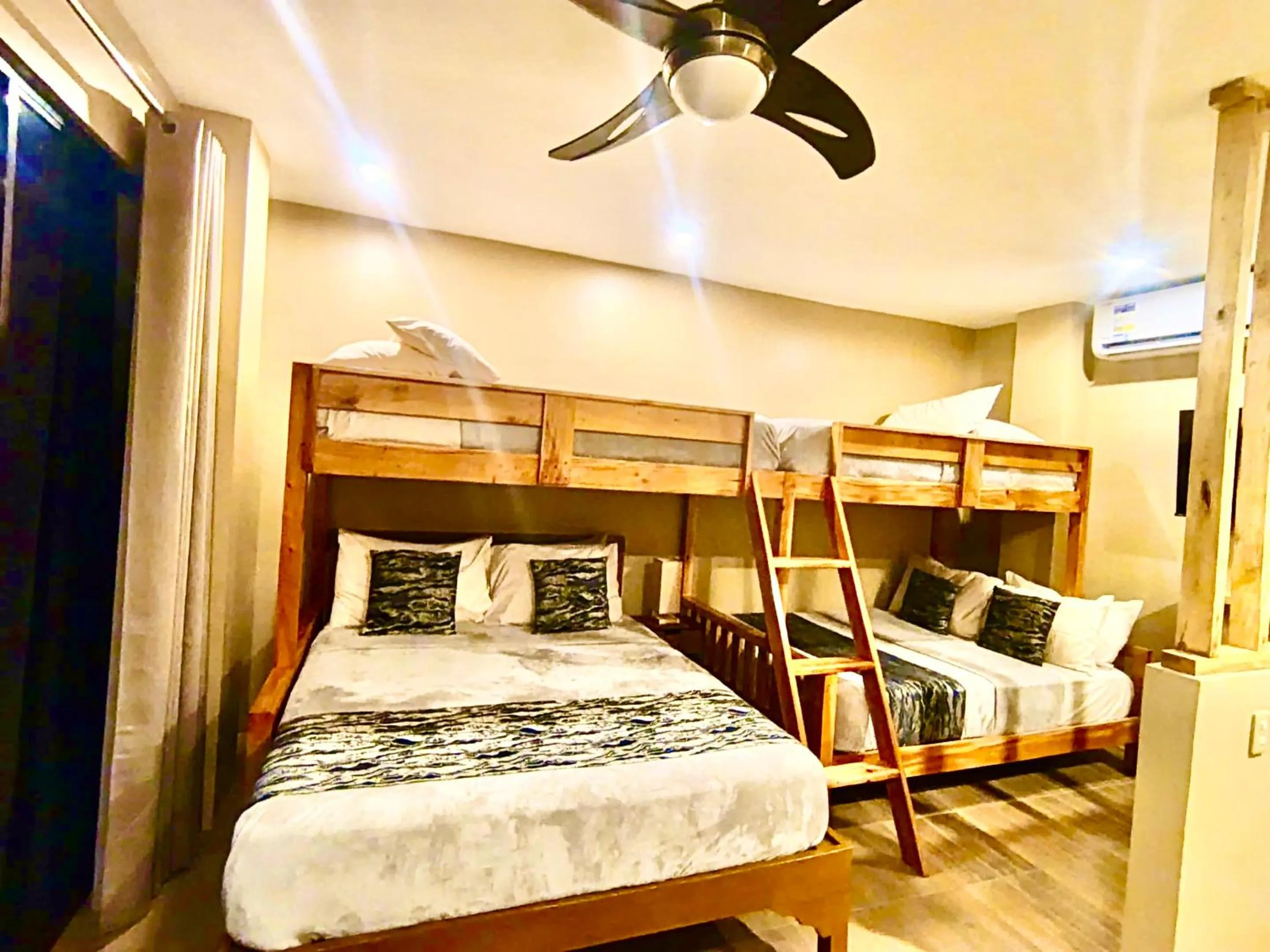 Bed in Southseas Beach Resort and Dive Center