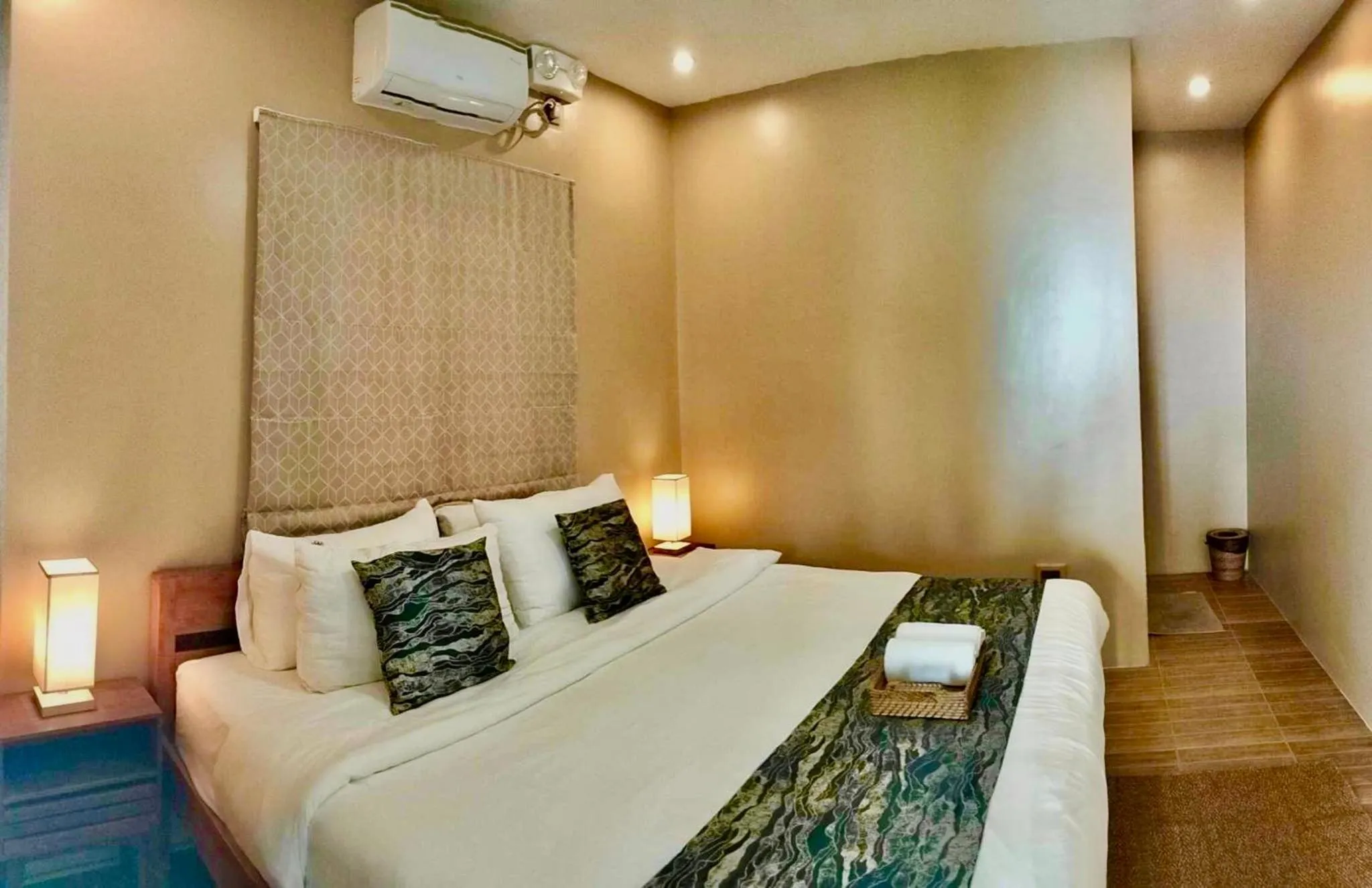 Bed in Southseas Beach Resort and Dive Center