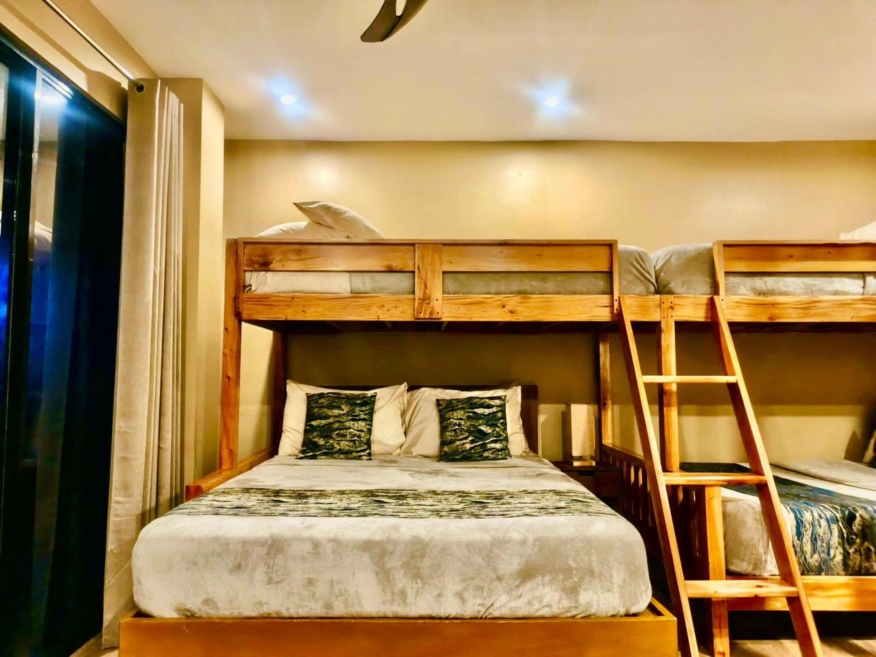 Bed in Southseas Beach Resort and Dive Center