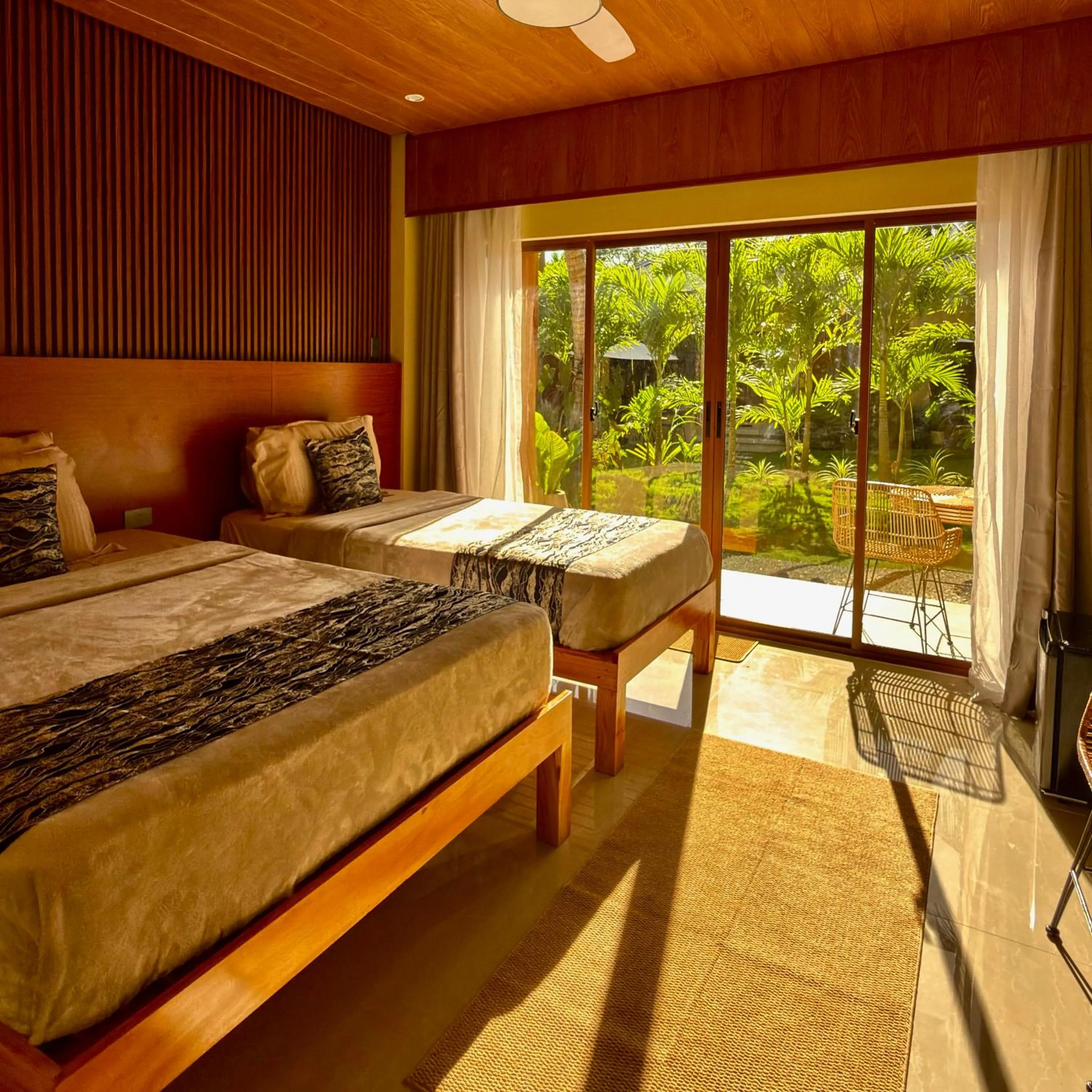 Bed in Southseas Beach Resort and Dive Center