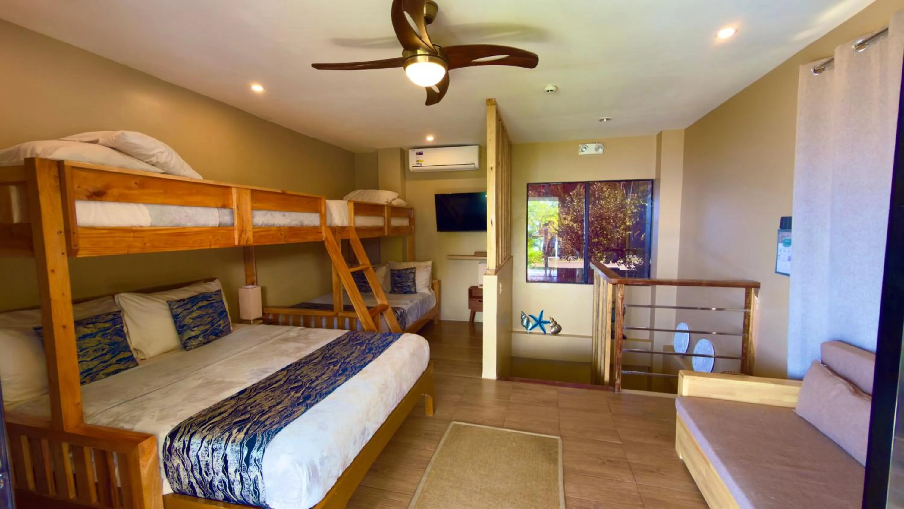 Bed in Southseas Beach Resort and Dive Center